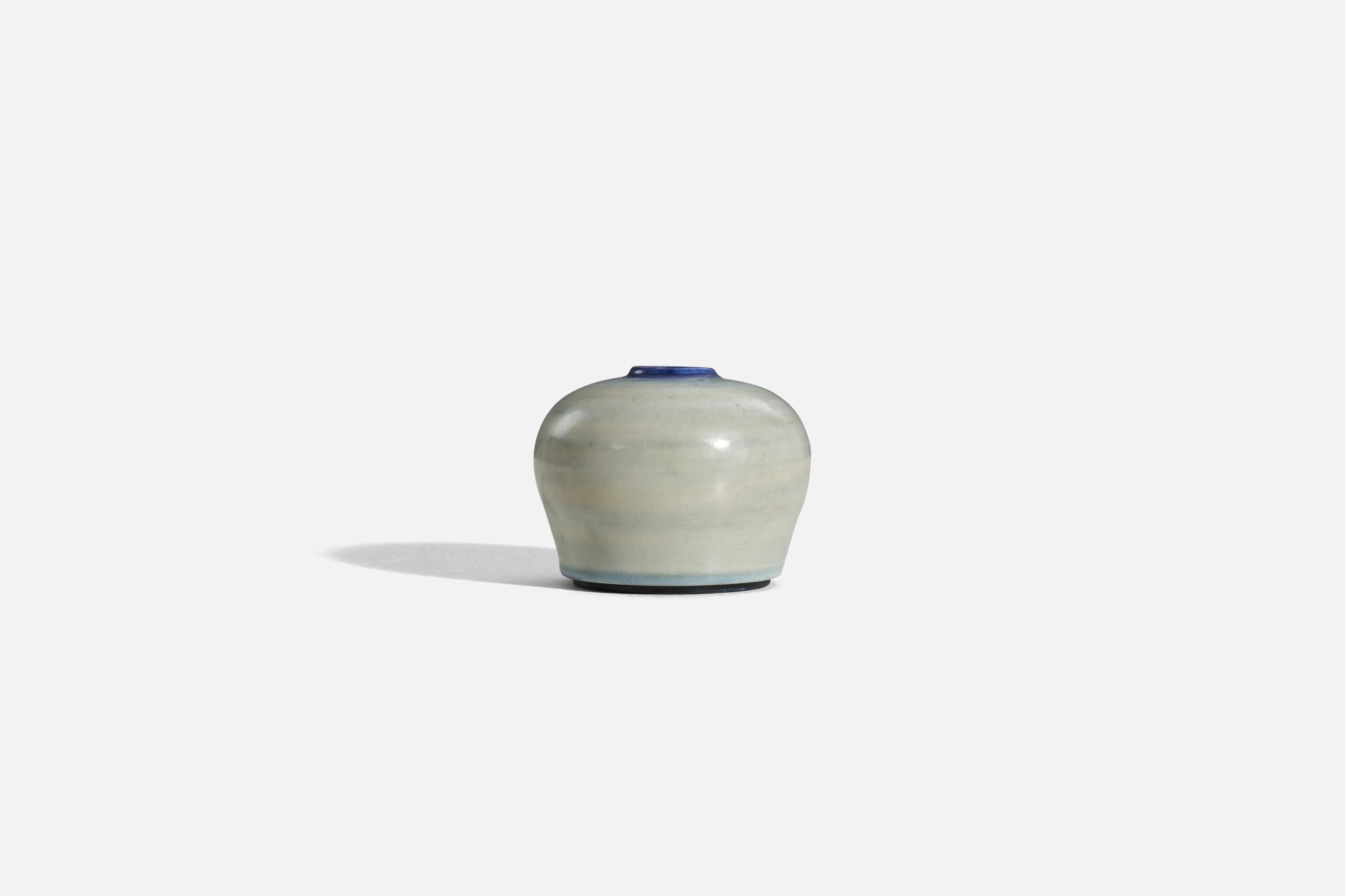 A blue, beige-glazed stoneware vase designed by Getrud Lönegren and produced by Rörstrand, Sweden, c. 1940s.
   