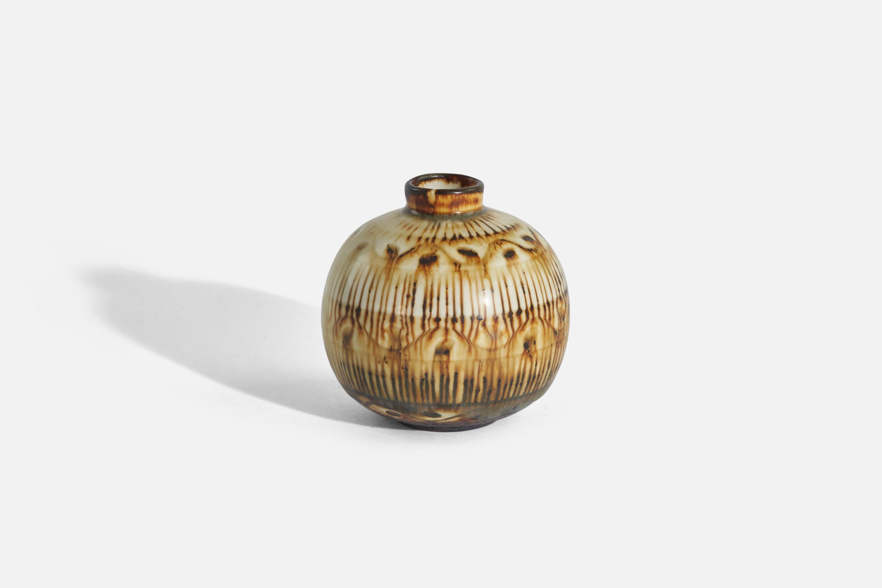 A brown and white-glazed stoneware vase designed by Getrud Lönegren and produced by Rörstrand, Sweden, 1936-1941. 