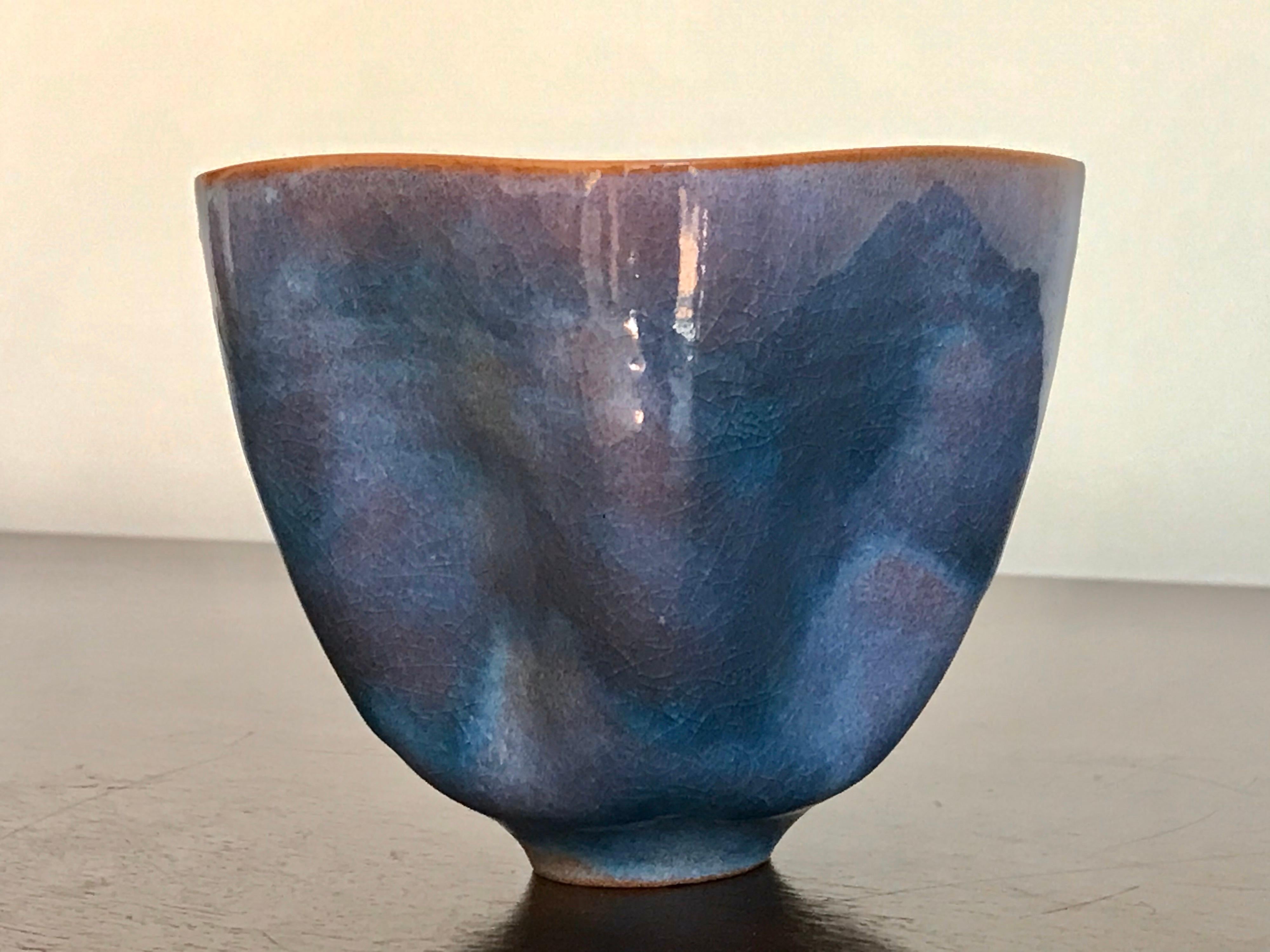 The Natzlers moved to Los Angeles from Austria in 1938. They were trained artisans. She made the simple pristine forms and he made the amazing glaze designs.
This piece here is an exceptional example of both of their applied techniques.
Wheel thrown