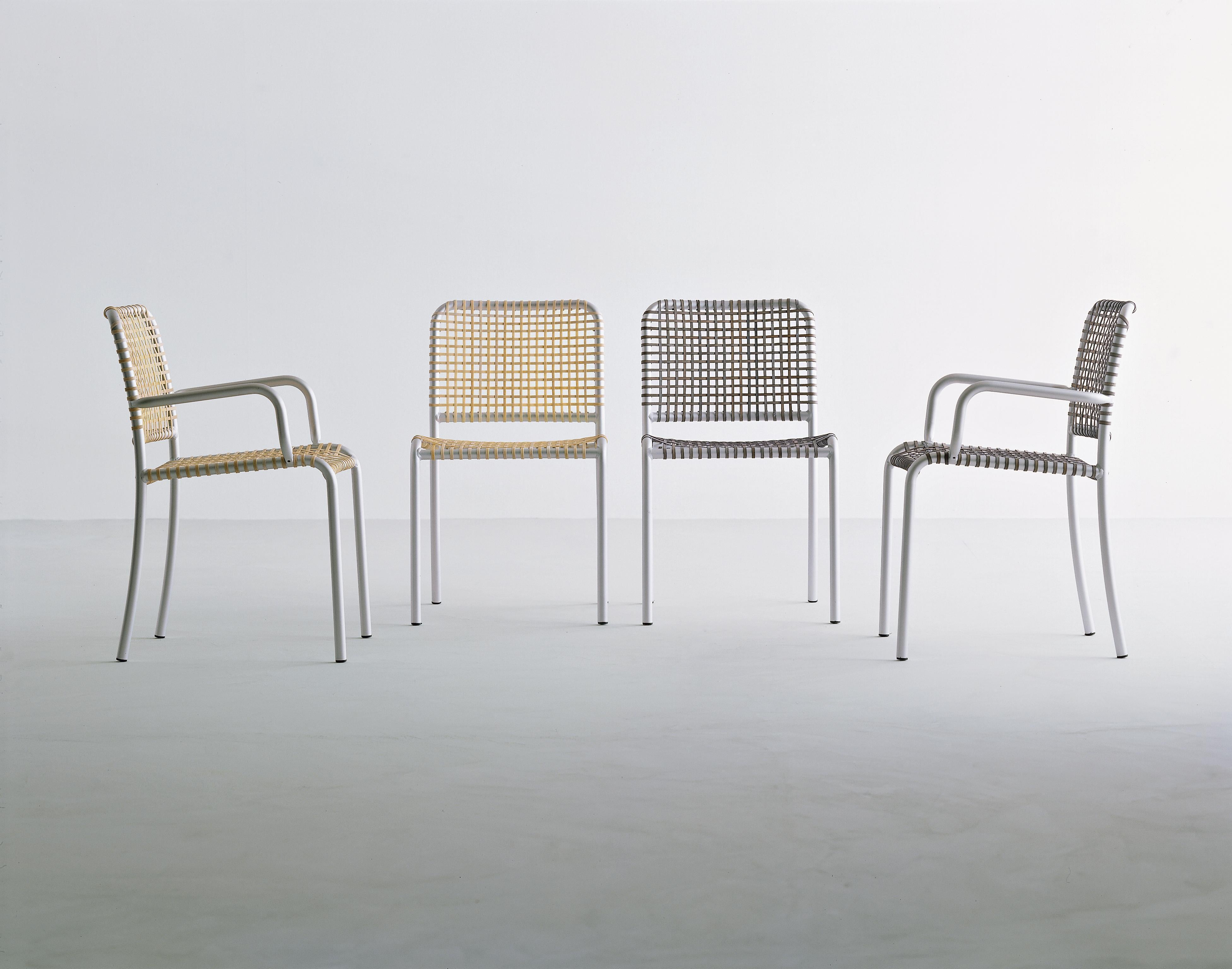 Versatile and comfortable, the Allu chair family combines the lightness and essentiality of the anodised aluminium tubular structure with a dynamic mix of textures, created by the weaving in natural or grey parchment. Able to fit into any