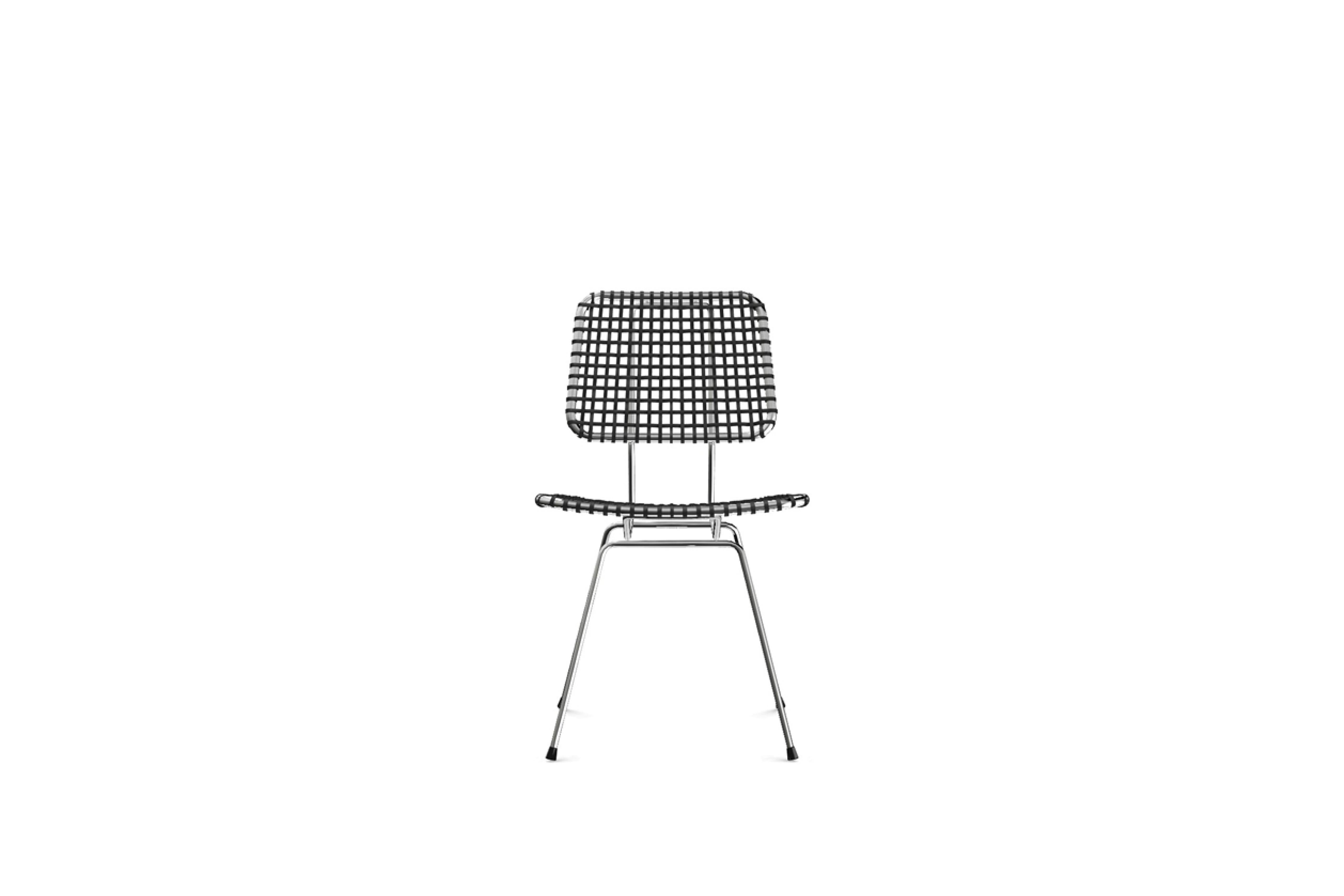 The Brick 23 chair without armrests has a structure in polished chromed steel rod. Light lines and low thicknesses are emphasised by the grey parchment weave of the seat and backrest.

Chair, chromed steel frame, seat and back handwoven with grey