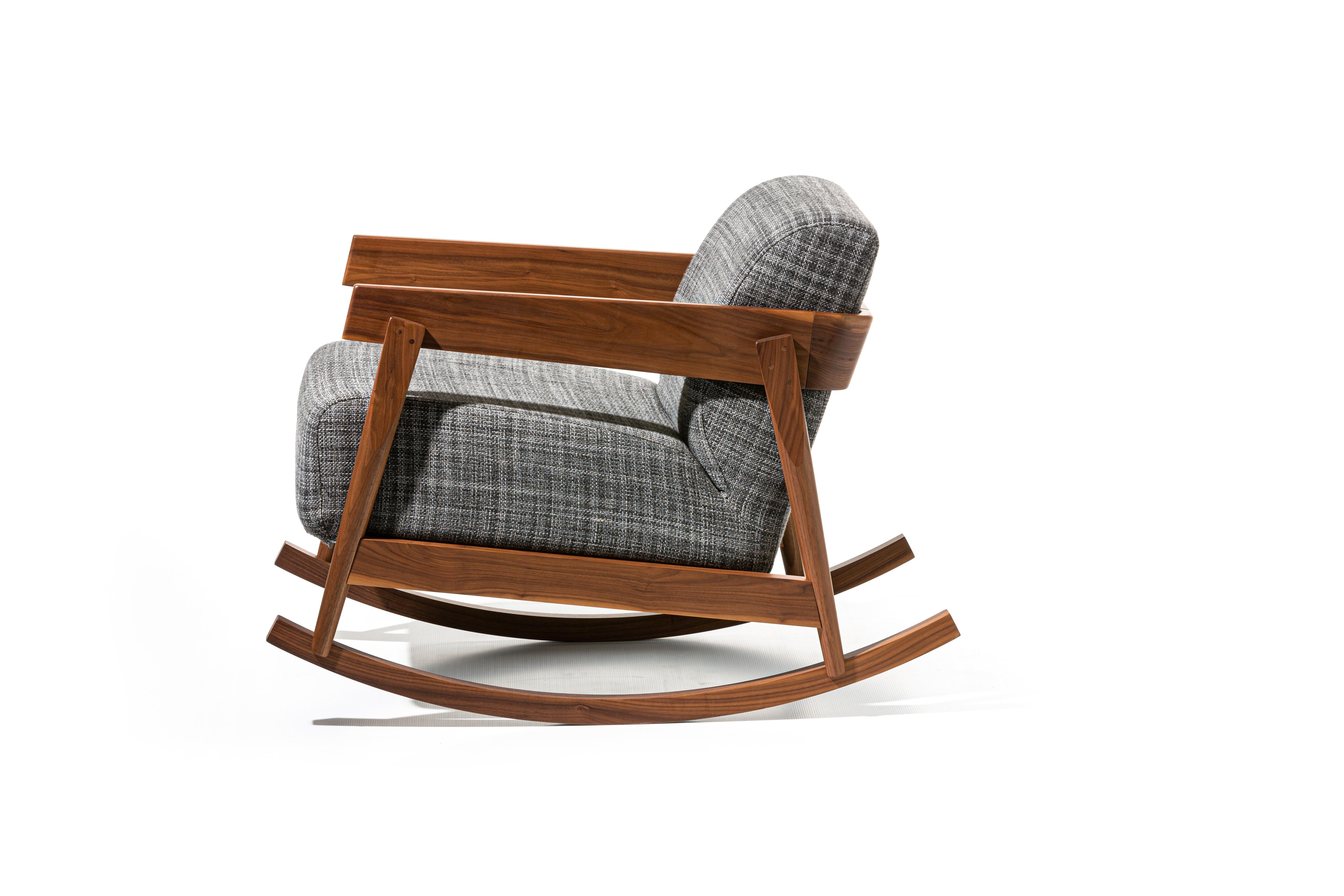 Rocking chair in solid natural Canaletto walnut, bleached oak or oak lacquered in white, grey, black, ocean or dove-grey, Brick 307 has the seat and backrest softened by a single cushion padded in polyurethane foam with a removable cover. The