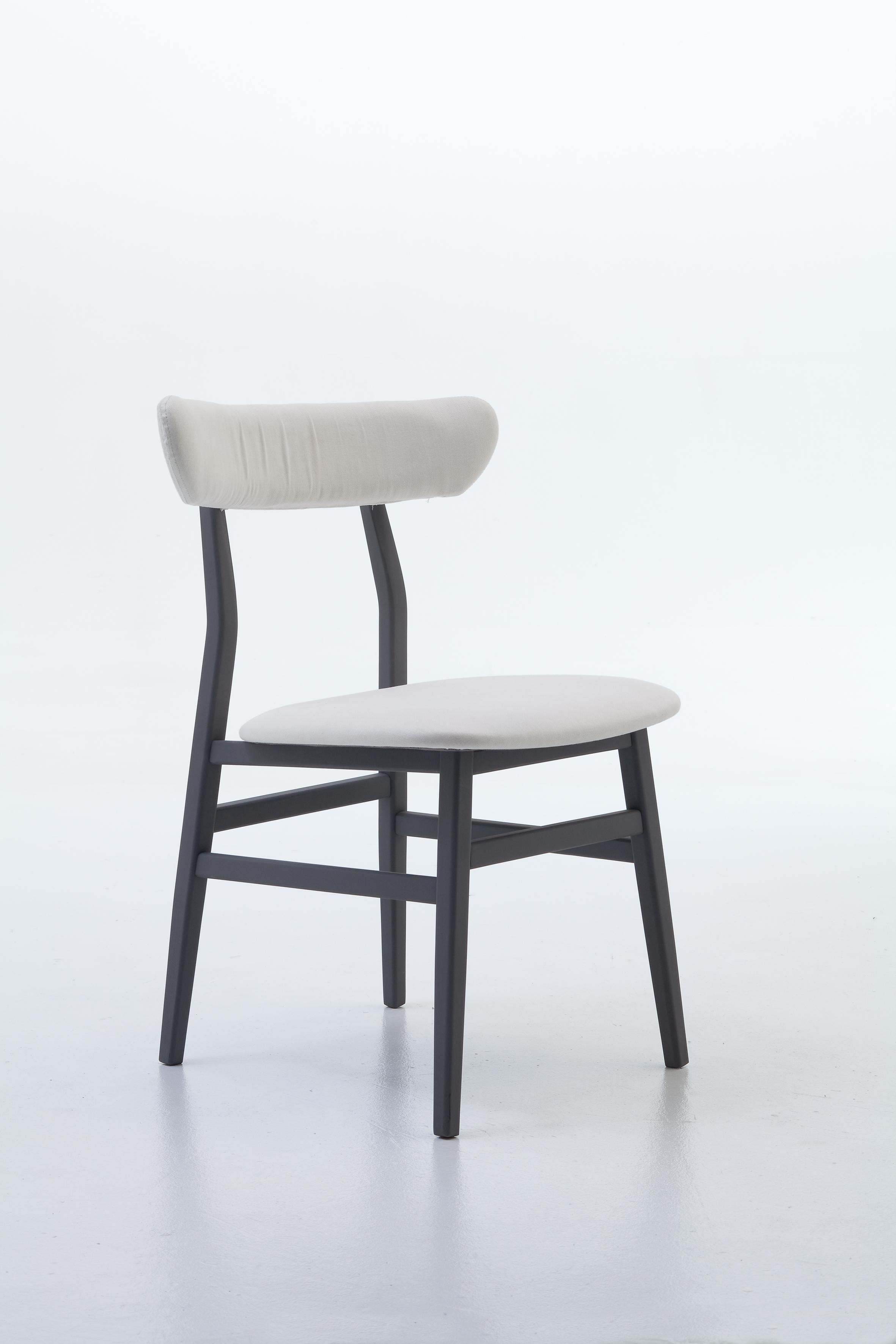 Nordic suggestions and industrial touches give life to the Brick 221/223 family of chairs. With a clean, simple structure in natural lacquered solid Canaletto walnut or beech lacquered in white, grey, black, ocean or dove-grey, they have padded back