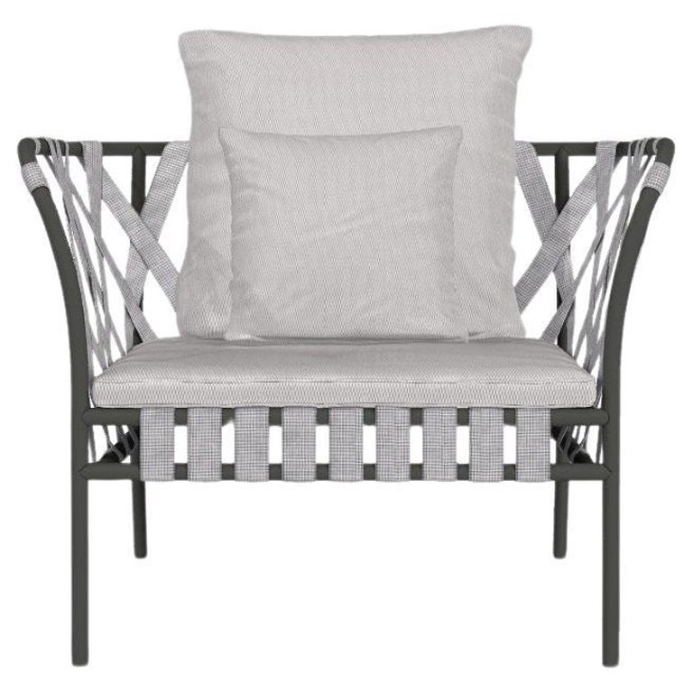 Sillón Gervasoni Inout en tapicería Aspen 02 con estructura de aluminio gris