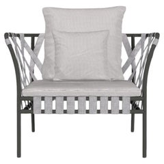 Sillón Gervasoni Inout en tapicería Aspen 02 con estructura de aluminio gris