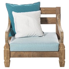 Poltrona Gervasoni Jeko 05 in tappezzeria Capri 06 e ECOTeak di Paola Navone