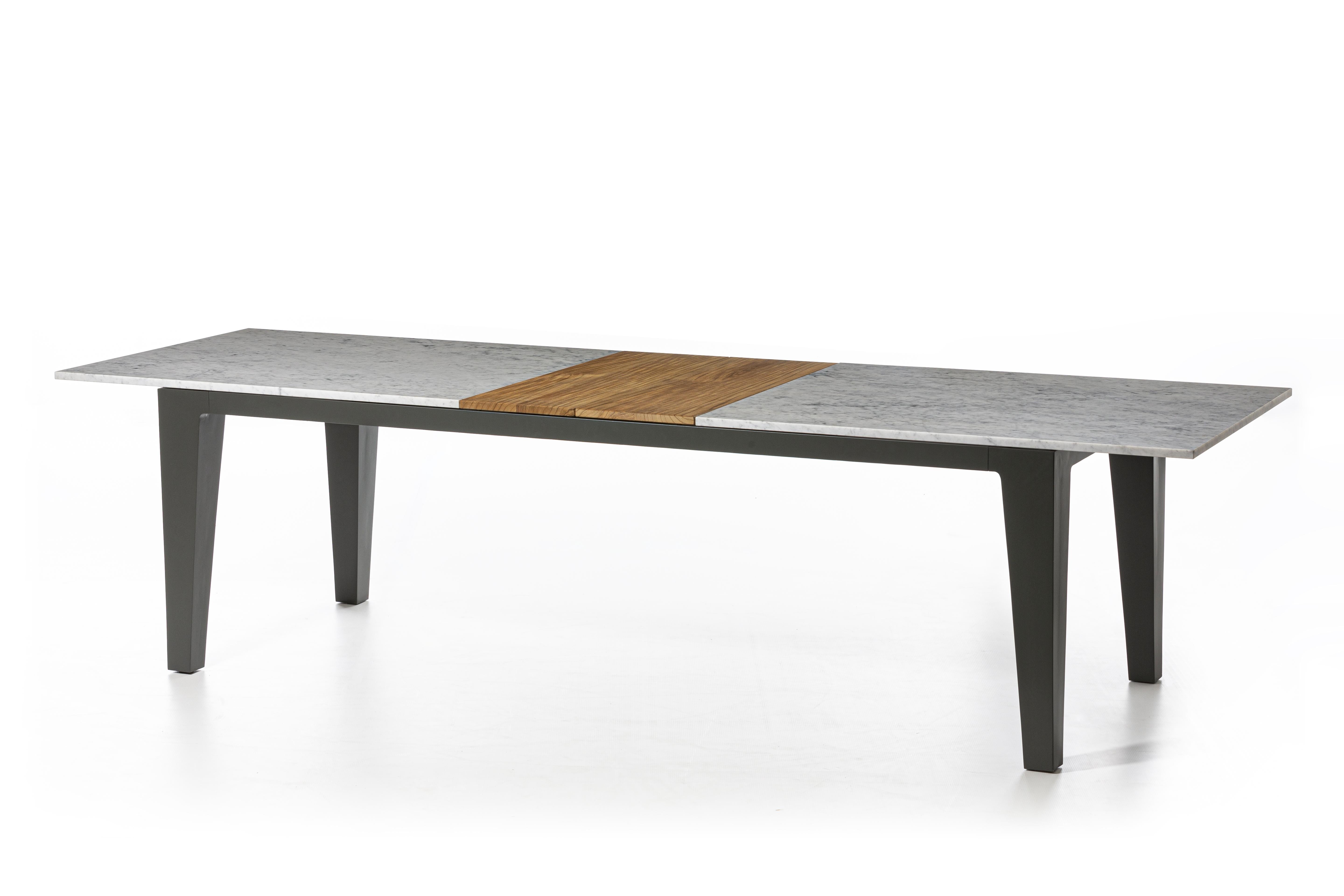 Family of tables born from the union of different materials, Inout 143/144 have a rectangular top and are available in various sizes. Formed of a structure in matt white, grey or sage painted aluminium, they have the top available in different