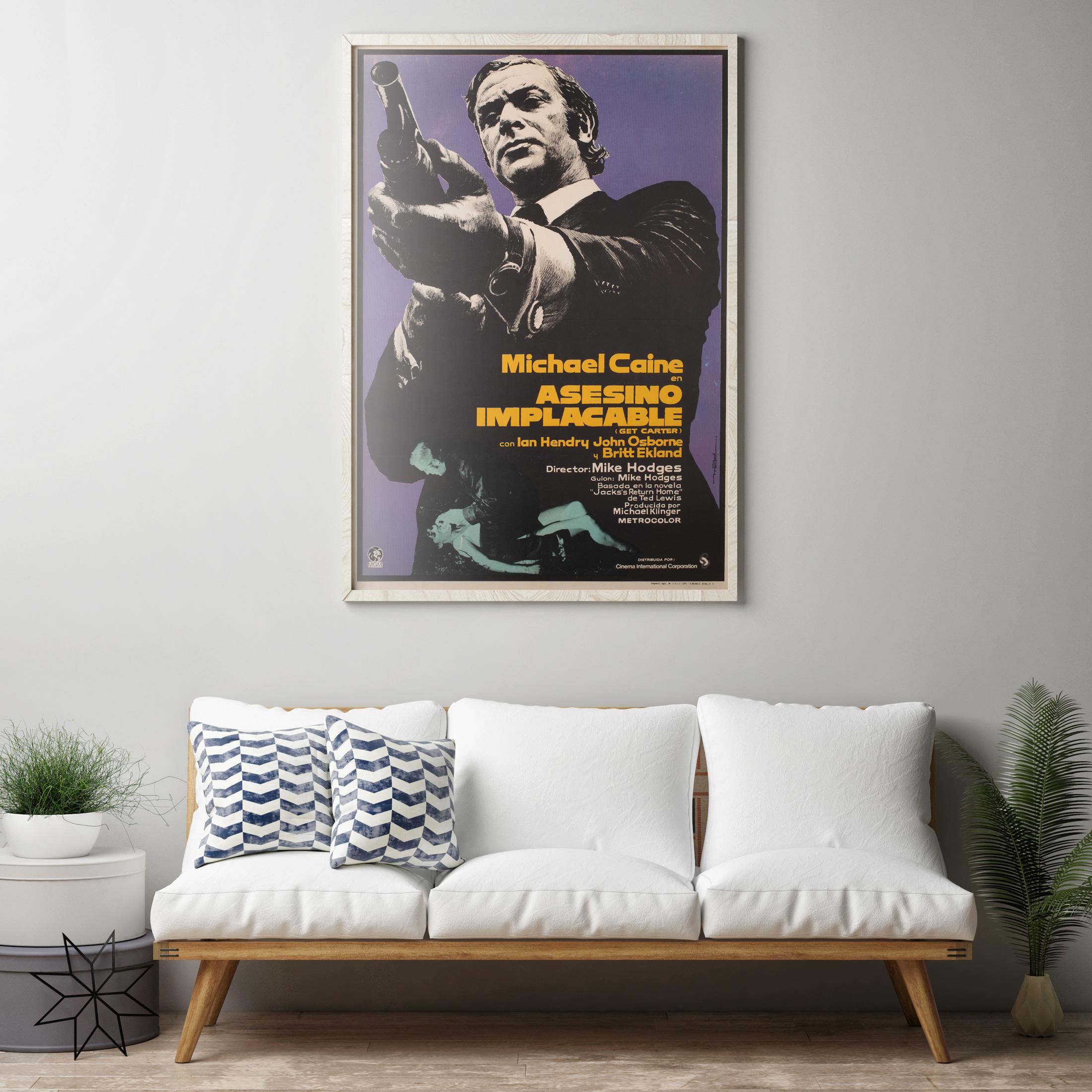The Spanish 1 Sheet features the striking artwork by Mac of the fiercely dominating character of Michael Caine in one of his best roles as Jack Carter in Get Carter. Undoubtedly one of the greatest gangster films ever made.

This original vintage