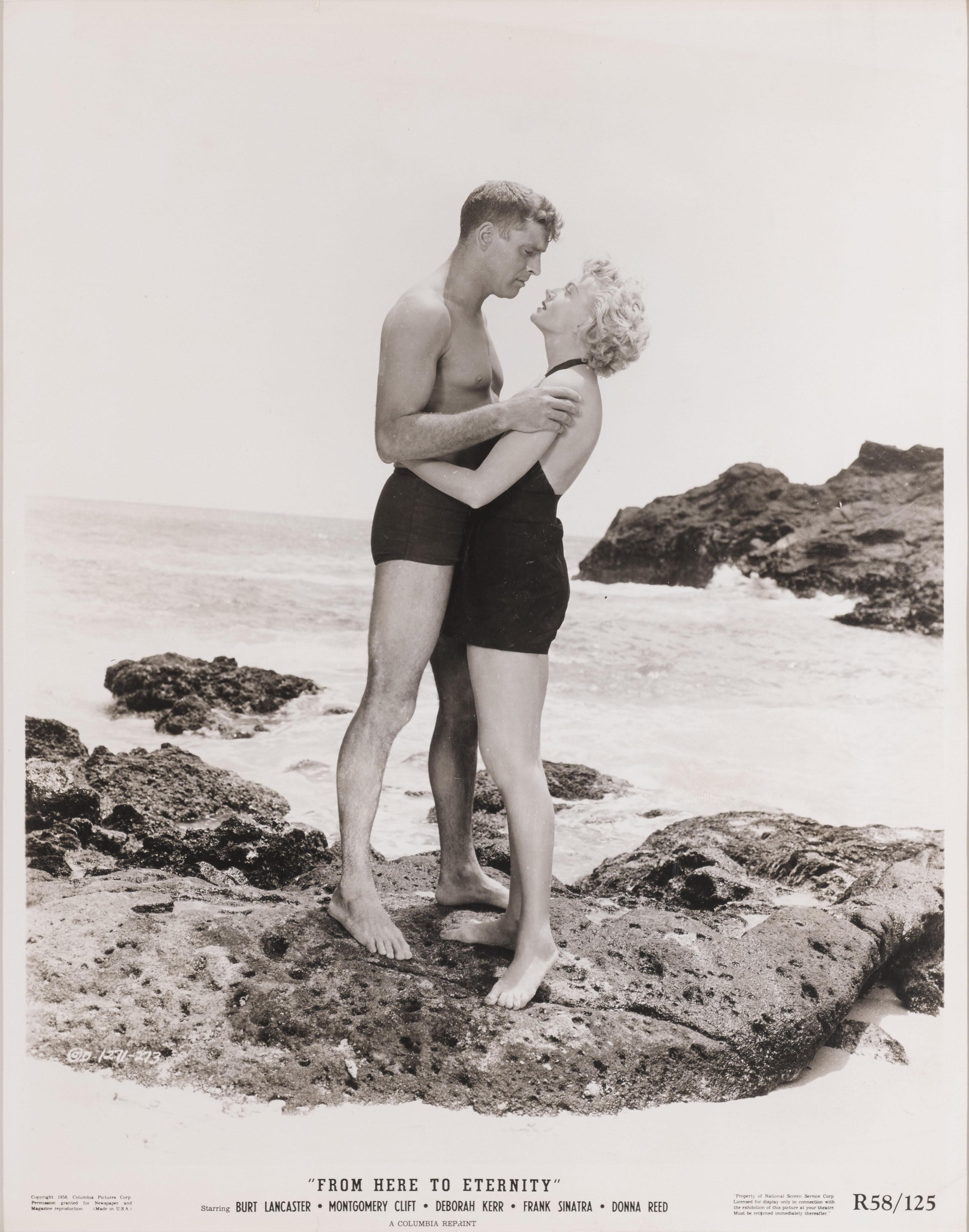 Original US photographic production still for the 1953 film From Here to Eternity.
This still is from the Re-release of the film in 1958.
The film Starred Burt Lancaster, Montgomery Clift, Deborah Kerr, Frank Sinatra. This film was directed by