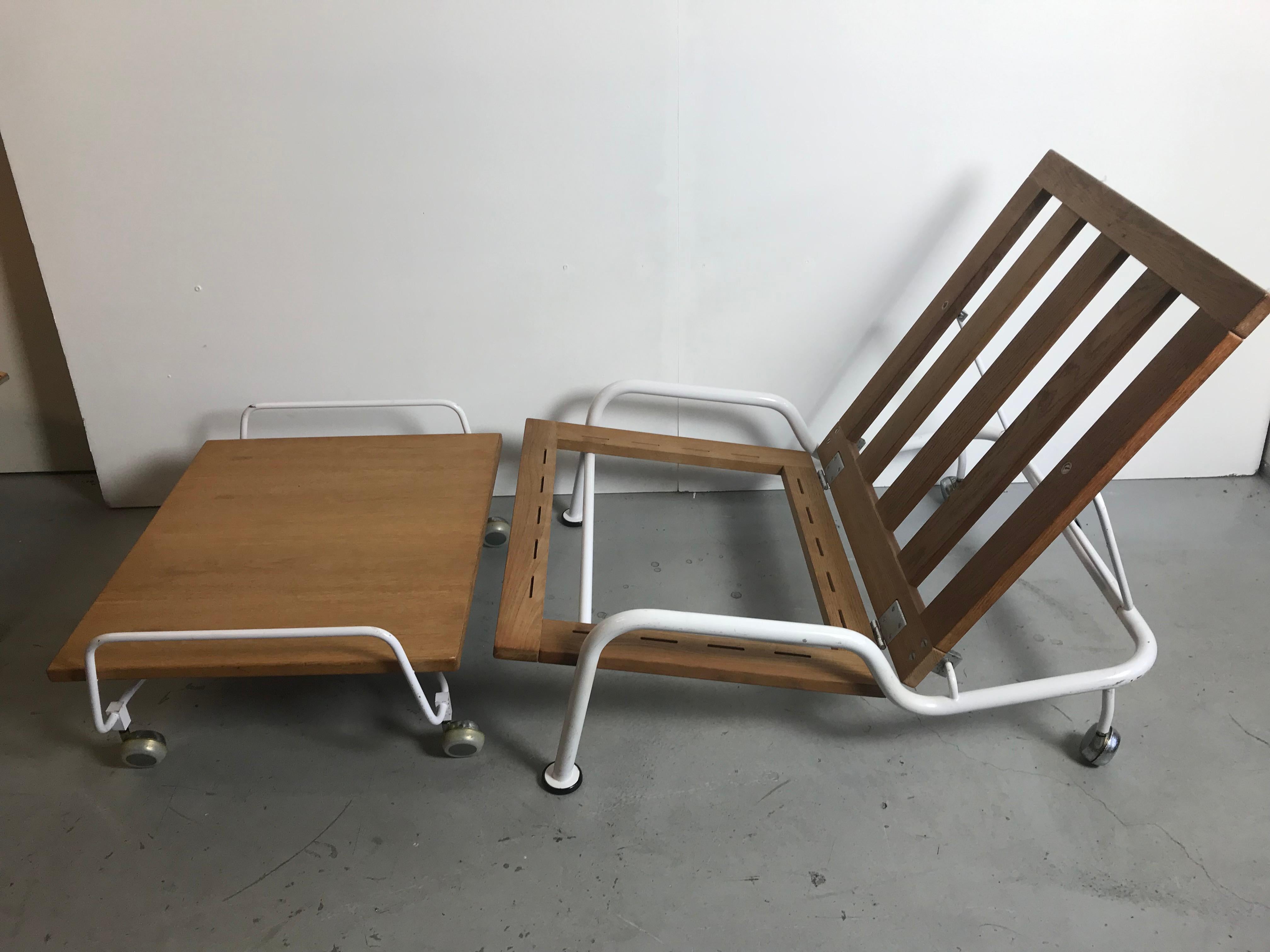 Rare Wegner easy chair with ottoman.
It is a prototype named GE 440. This item is produced in Denmark for GETAMA in the late 1960s.
Made of white lacquered metal with original upholstered pillows. The chair has been designed for an exposition in