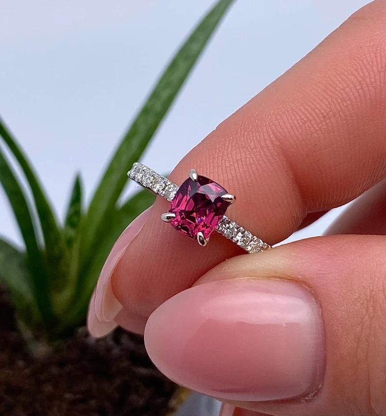  Ring With Natural Spinel  and Diamonds gemstone
14 Karat White Gold Ring

Laboratory full certificate for the ring.
Tourmaline have own certificate GFCO
Main Stone: Spinel
Main Stone Creation: Natural
Main Stone Color: reddish pink
Main Stone