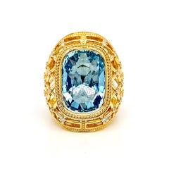 Anello in oro giallo con acquamarina tonda e diamante certificato GFCO da 15.59 carati