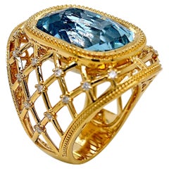 Anello in oro giallo con acquamarina tonda e diamante certificato GFCO da 15.59 carati