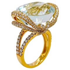 Anello in oro giallo con acquamarina rotonda e diamante certificato GFCO 23,46