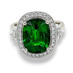 Anello in oro bianco con diamanti fantasia certificati GFCO da 5.86 carati di tsavorite