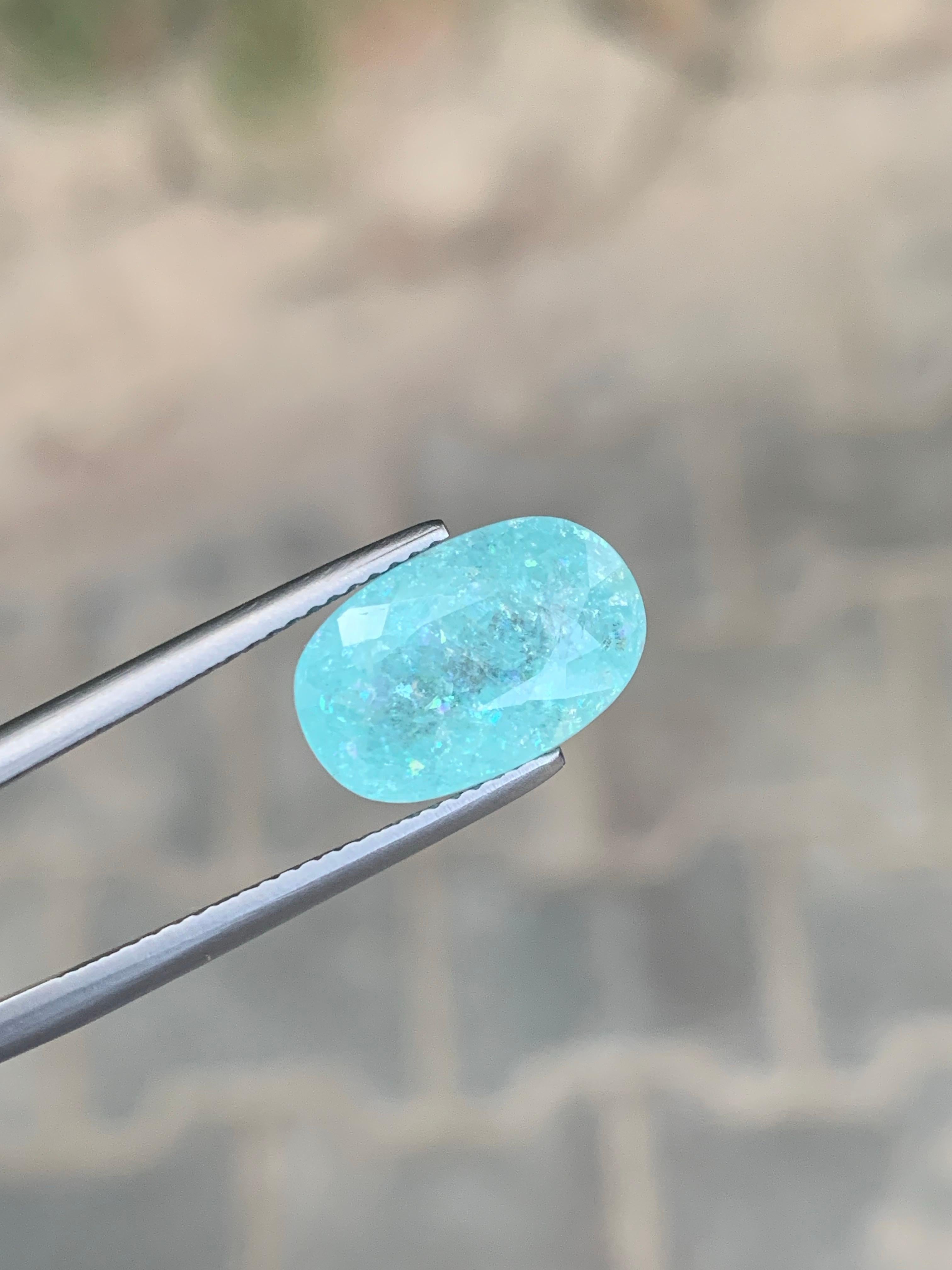 Gemma naturale sfusa di forma ovale di tormalina Paraiba certificata GFCO da 6,45 carati In condizioni Nuovo in vendita a Peshawar, PK