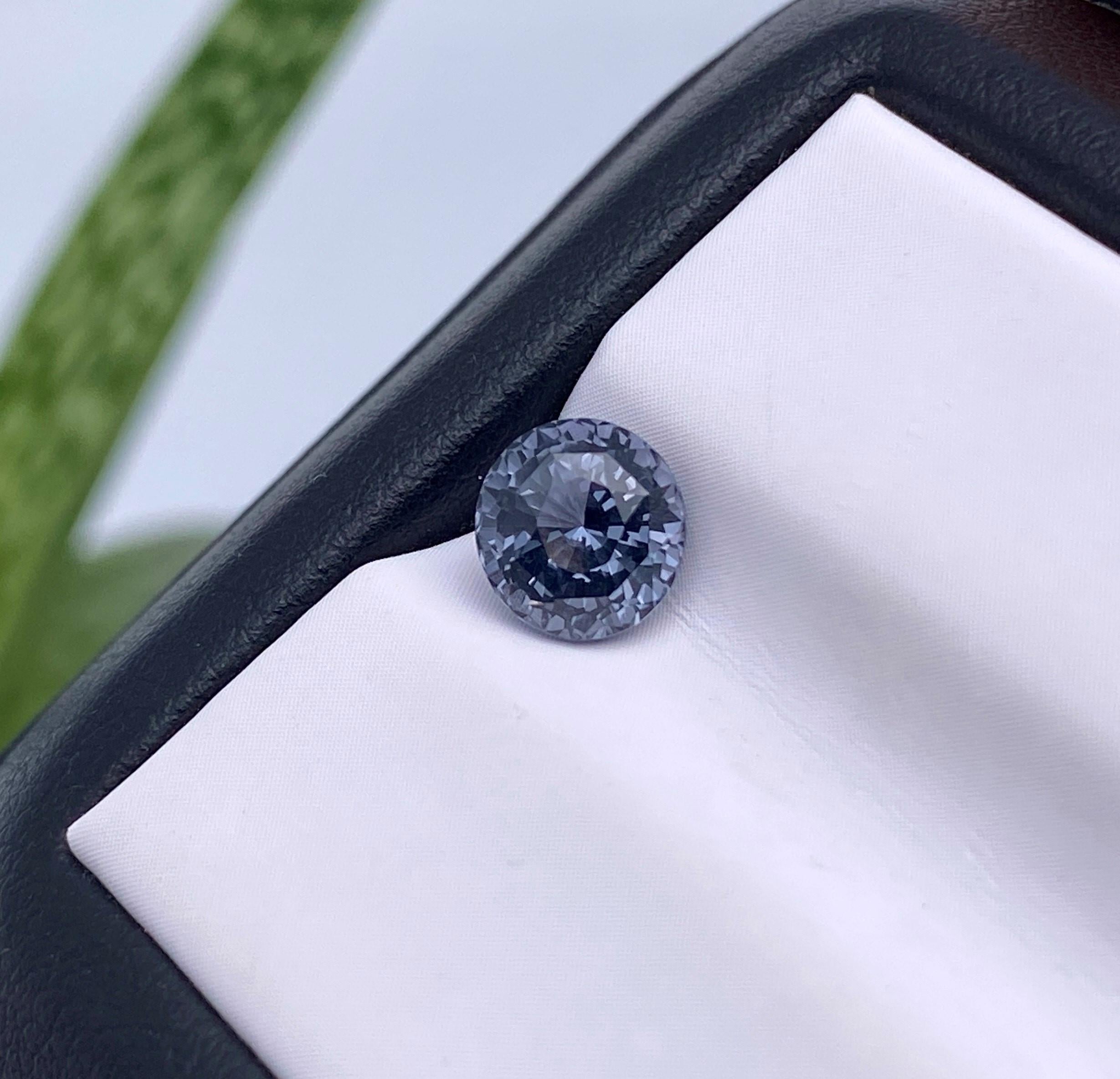 Natural Spinel gemstone

Laboratory certified GFCO
Gemstone Color: Violet
Gemstone Type: Spinel
Gemstone size: 6.70x6.64x4.76mm
Cut Grade: Very Good
Clarity/Grade: VS
Gemstone Shape: Round Brilliant Fancy Cut
Gemstone Creation: Natural
Gemstone