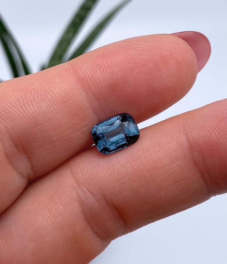 Natural Blue Cobalt Spinel gemstone

GFCO Laboratory certified
Gemstone Color: Blue
Gemstone Type: Spinel
Gemstone size: 8.98x6.67x4.69mm
Cut Grade: Very Good
Clarity/Grade: VS
Gemstone Shape: Cushion Cut
Gemstone Creation: Natural
Gemstone