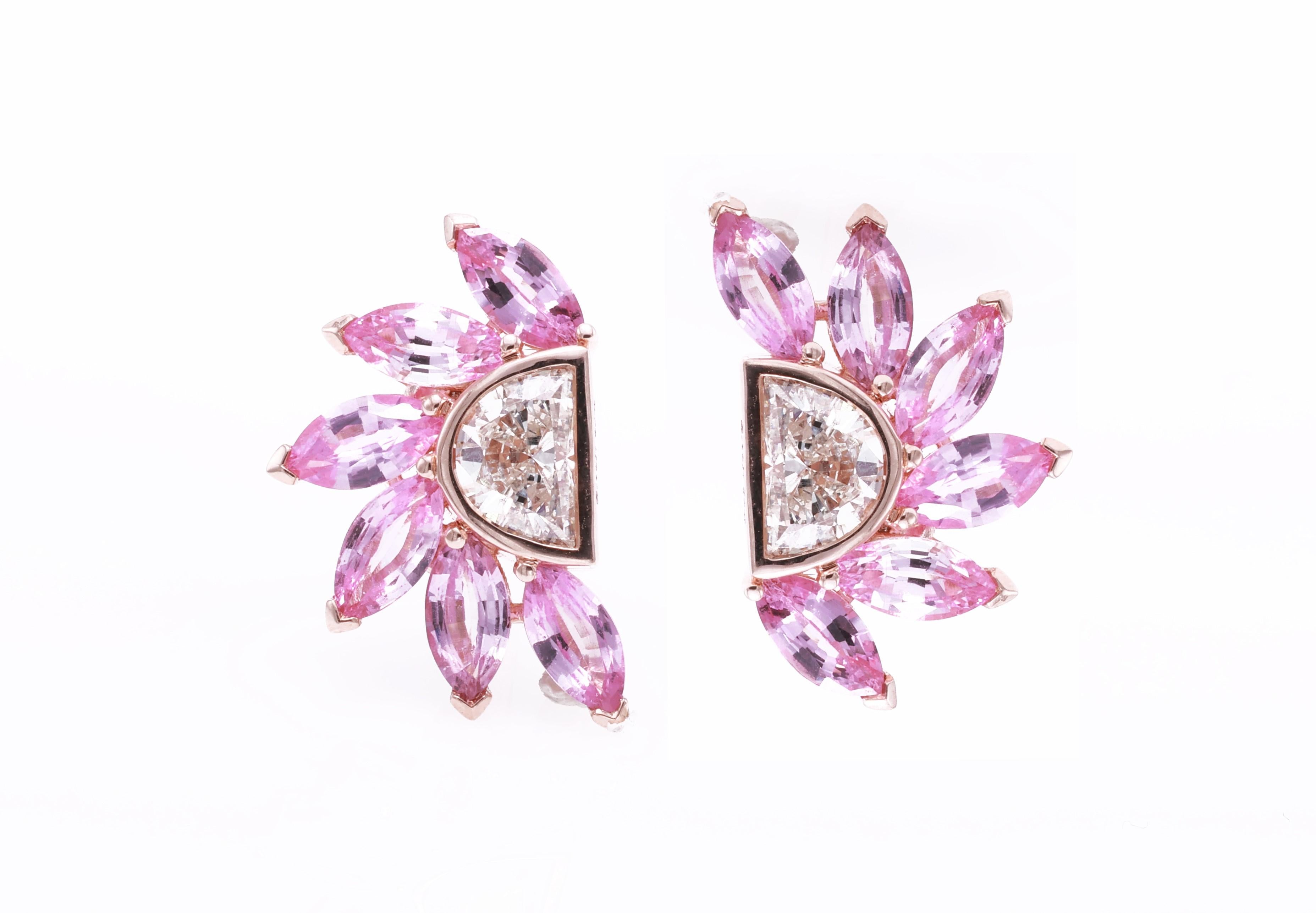 18kt white gold earring with diamonds
  
  Gold colour & karat: White gold 18kt
  Weight: 2.816 grams
  
  Set with-
  Stone type: Sapphire
  Shape: Marquise
  Carat: 2.07 (12 Pcs ) 
  Colour: Vivid Pink
  Clarity: -
  
  Surrounding Stones: