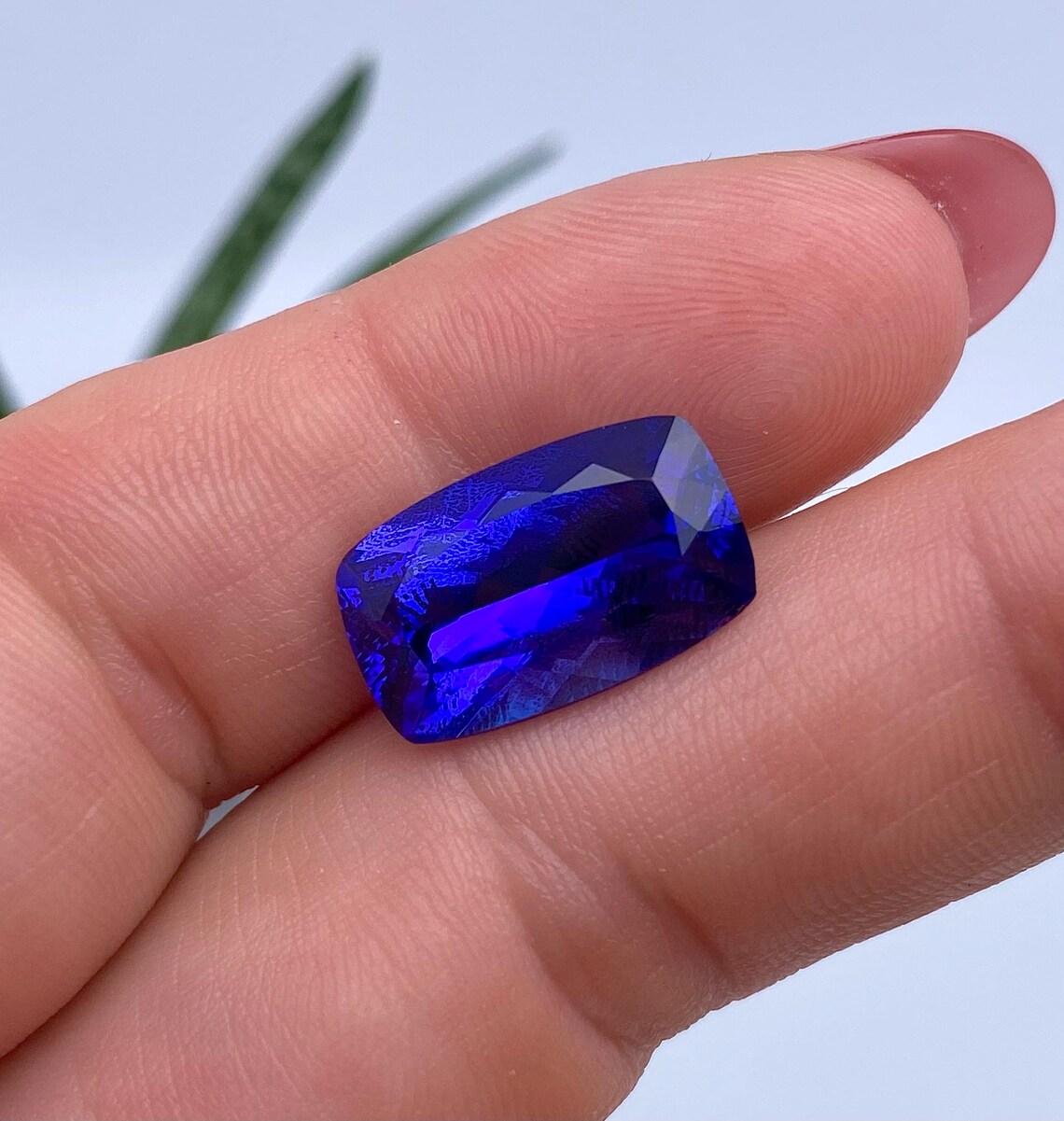 Natural Tanzanite gemstone

GFCO Certified gemstone
Gemstone Color: Vivid Blue
Gemstone Type: Tanzanite
Gemstone size: 17.10x10.48x7.33mm
Cut Grade: Very Good
Gemstone Shape: Cushion fancy cut
Gemstone Creation: Natural
Gemstone Treatment: