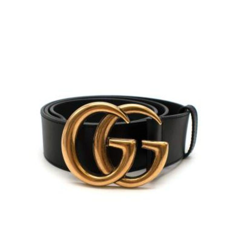 Gucci GG logo black leather belt
 
 
 
 -Gold tone hardware
 
 -GG buckle 
 
 -Black smooth leather body 
 
 -Adjustable buckle fastening 
 
 
 
 Material: 
 
 
 
 Leather 
 
 
 
 Made in Italy 
 
 
 
 PLEASE NOTE, THESE ITEMS ARE PRE-OWNED AND MAY