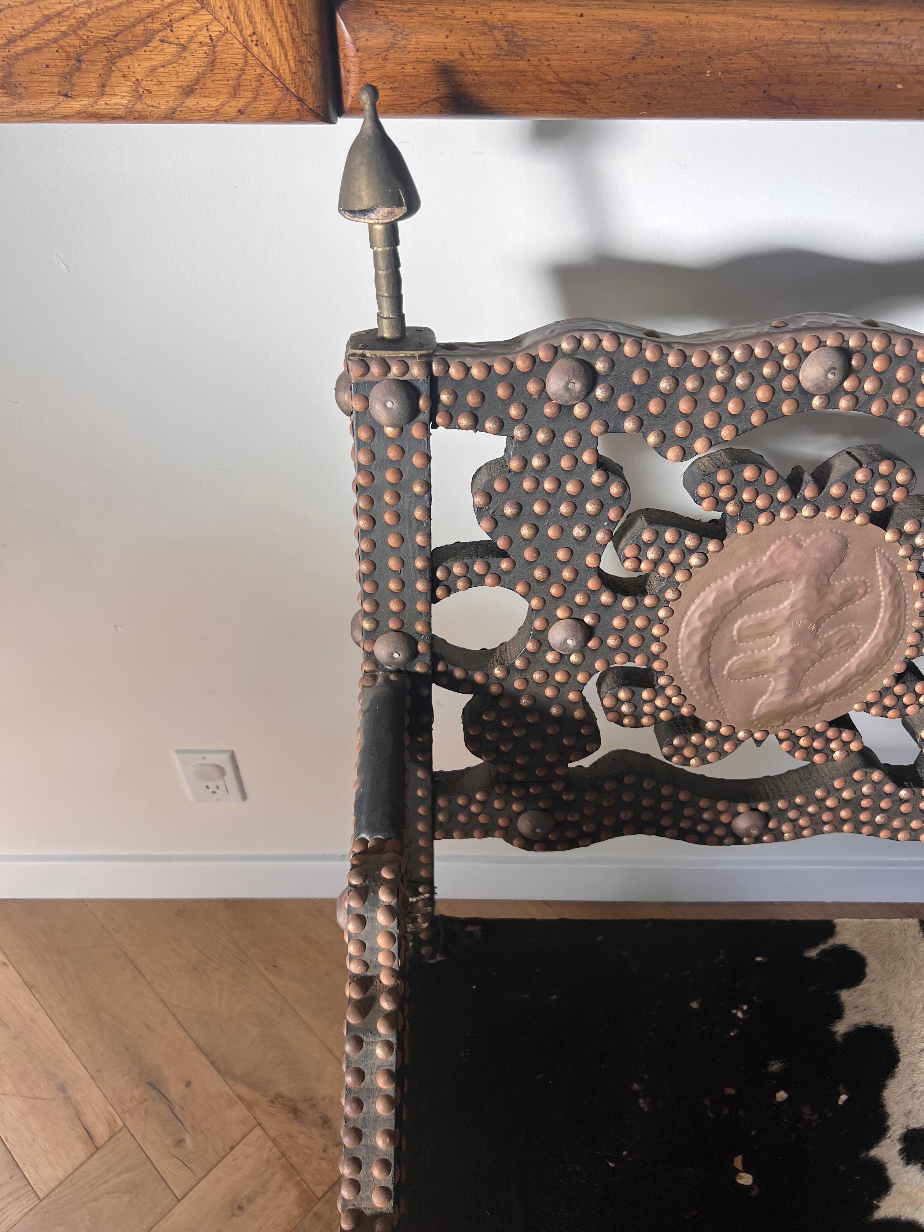 Ghanaian wood, iron, and cowhide chair, early 20th century For Sale 2