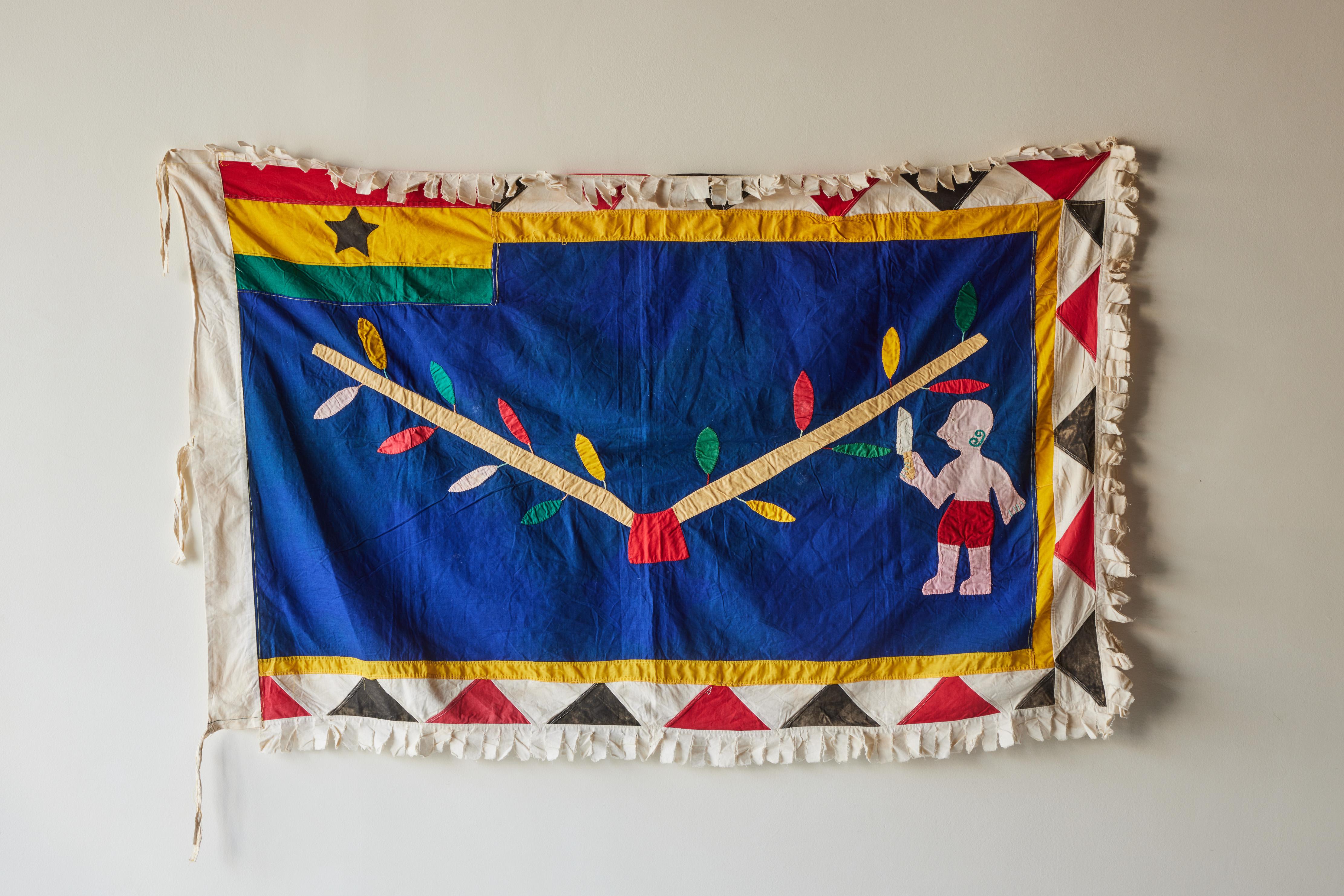 Asafo flag in cotton applique patterns from Ghana circa 1970s. Asafo Flags are created by the Fante People of Ghana. 

 