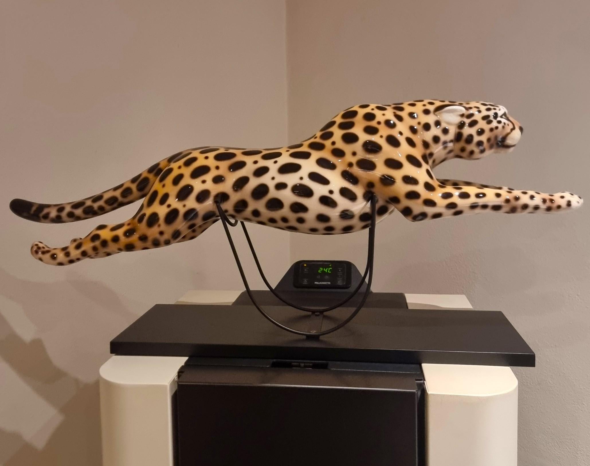 Painted ceramic cheetah with high-class base: elegance and character For Sale 4
