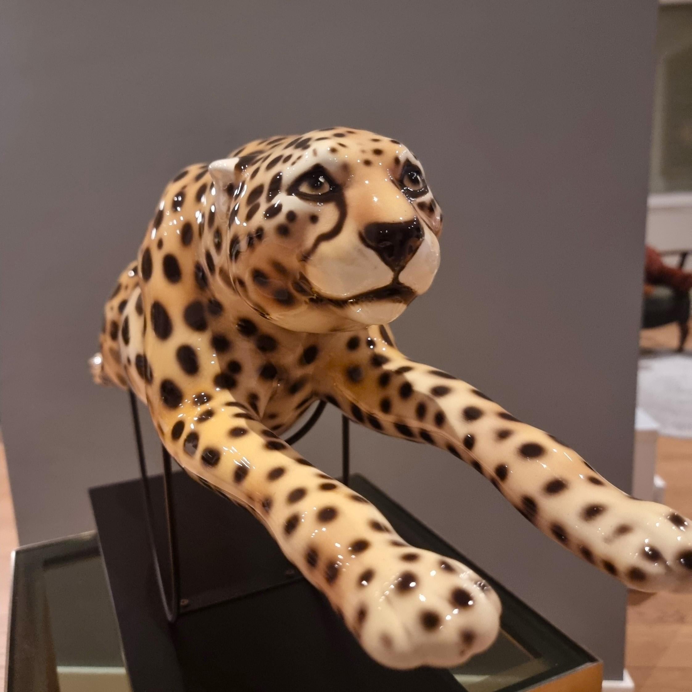Ceramic Painted ceramic cheetah with high-class base: elegance and character For Sale