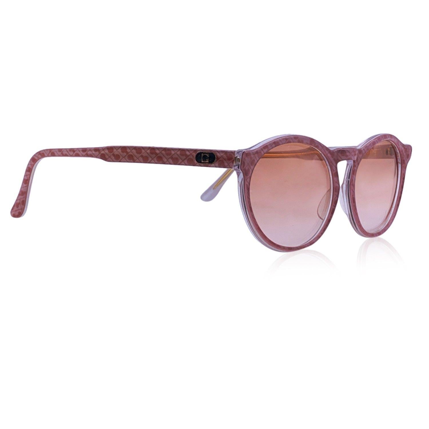 Vintage Gherardini sunglasses G/2. Pink acetate frame with logo pattern. Original 100% Total UVA/UVB protection in gradient brown color. Gherardini logo on temples. Made in Italy Details MATERIAL: Acetate COLOR: Pink MODEL: G/2 GENDER: Women COUNTRY