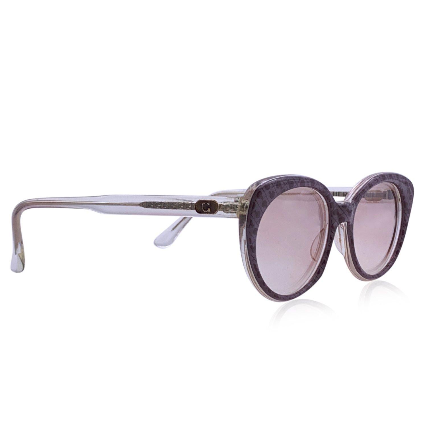 Vintage Gherardini sunglasses G/1. Grey acetate frame with logo pattern. Original 100% Total UVA/UVB protection in gradient brown color. Gherardini logo on temples. Made in Italy Details MATERIAL: Acetate COLOR: Grey MODEL: G/1 GENDER: Women COUNTRY