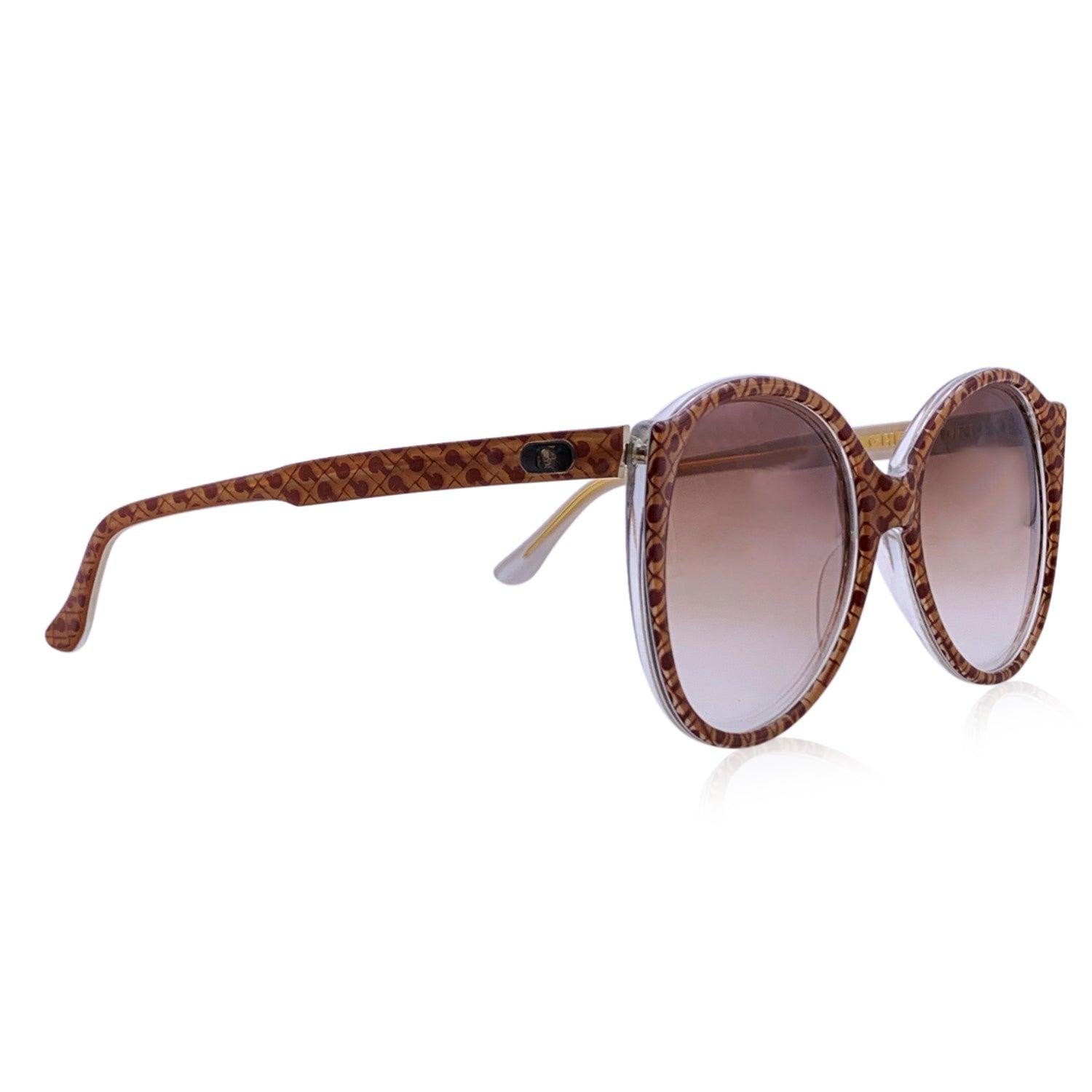 Vintage Gherardini sunglasses mod. Oro - G/17. Beige and brown acetate frame with logo pattern. Original 100% Total UVA/UVB protection in gradient brown color. Gherardini logo on temples. Made in Italy Details MATERIAL: Acetate COLOR: Brown MODEL: