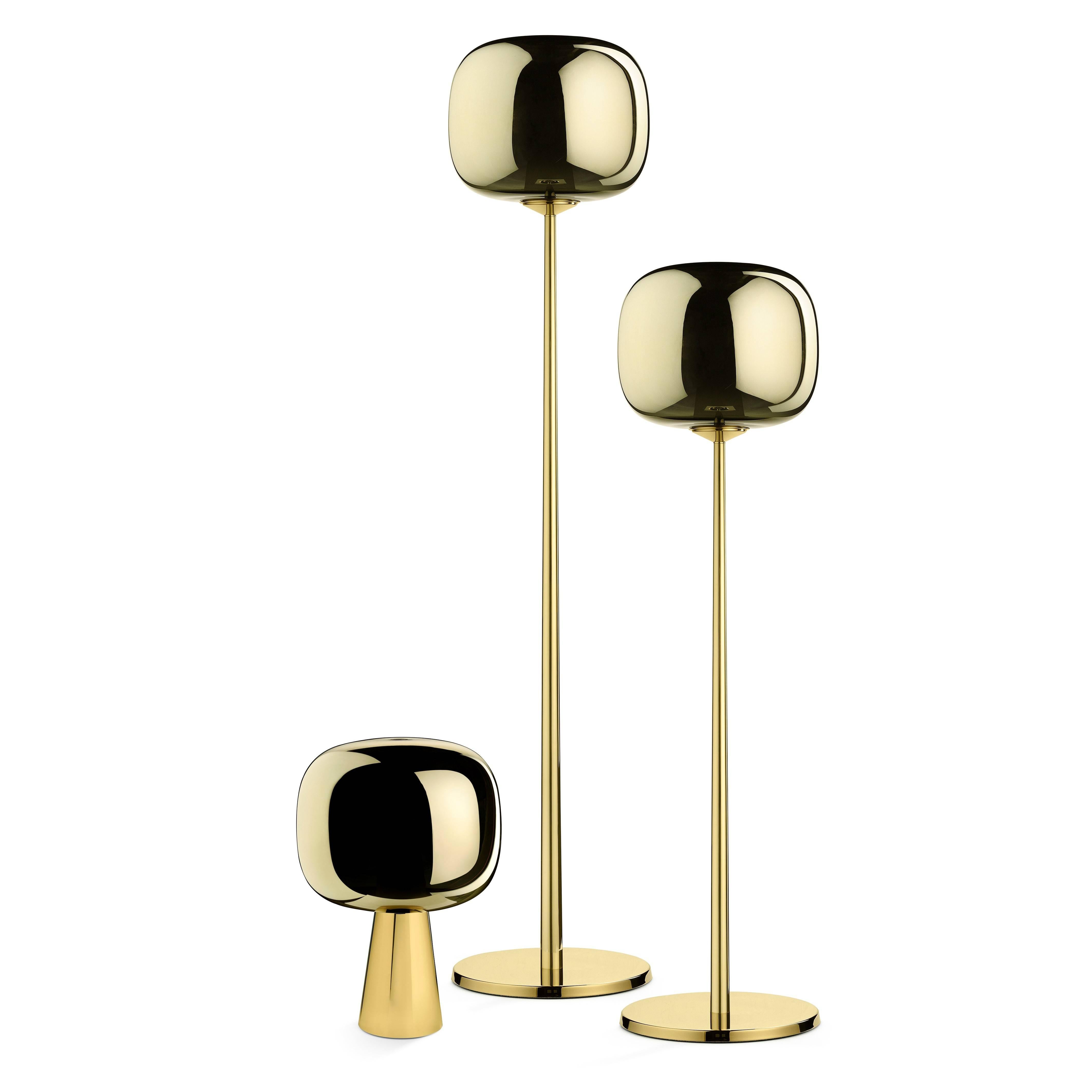 Dusk Dawn table lamp in polished brass and metalized glass.