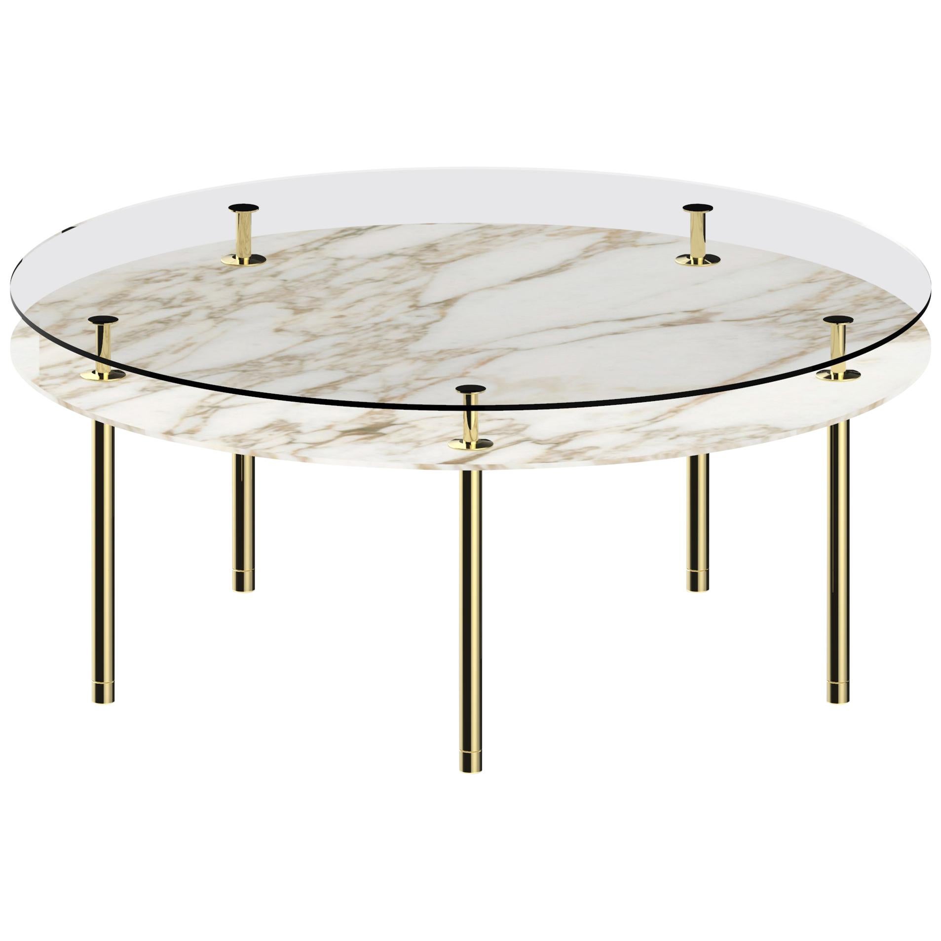 Mesa redonda con patas grandes Ghidini 1961 en calacatta dorado de Paolo Rizzatto