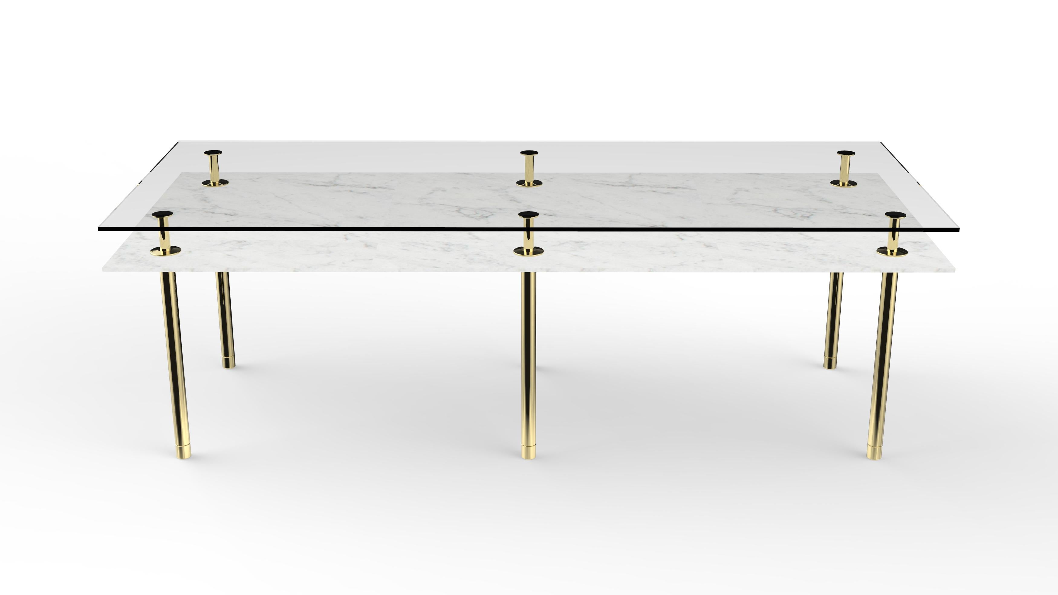 Rectangular table in crystal and brass. The designer imagines a turning point in the use of such a precious finishes such as polished brass: from the idea of almost a unique object in its perfect craftsmanship, to the system to be built starting