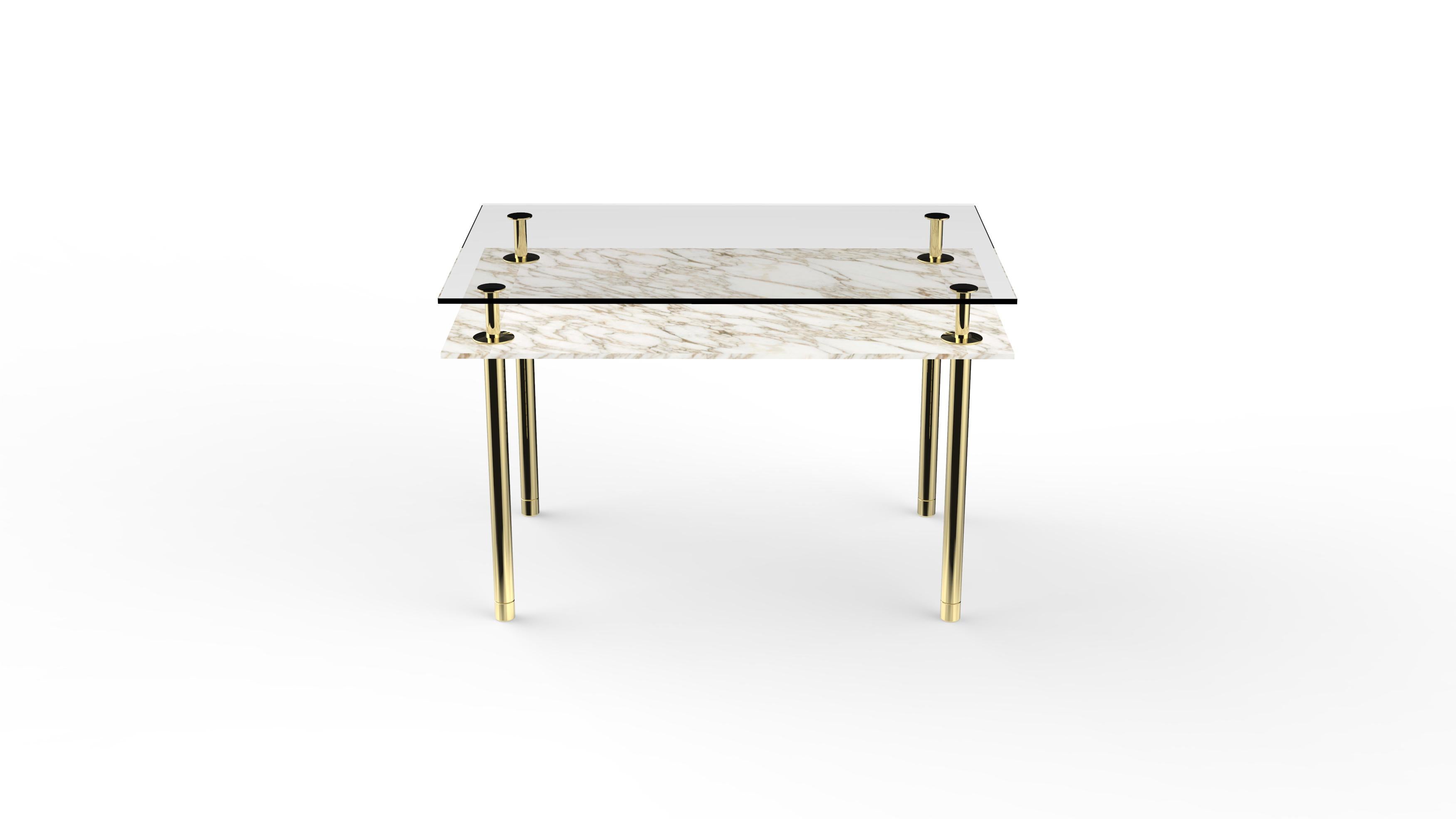 Rectangular table in crystal and brass. The designer imagines a turning point in the use of such a precious finishes such as polished brass: from the idea of almost a unique object in its perfect craftsmanship, to the system to be built starting