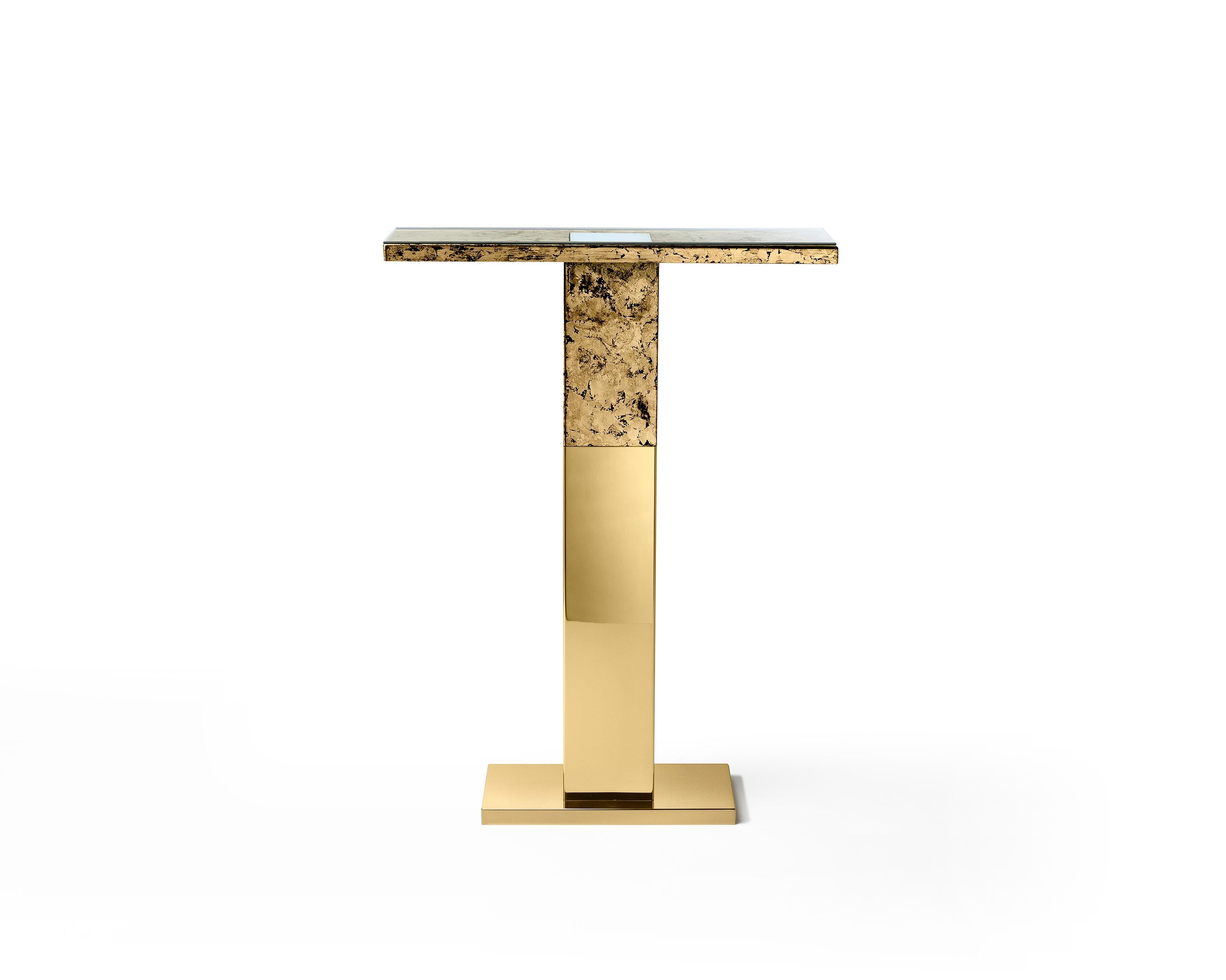 Console in stainless steel, handmade finish. Backlit Console: holds vases, books, sculptures.

Materials:
24k Gold plated stainless steel and acid etching.