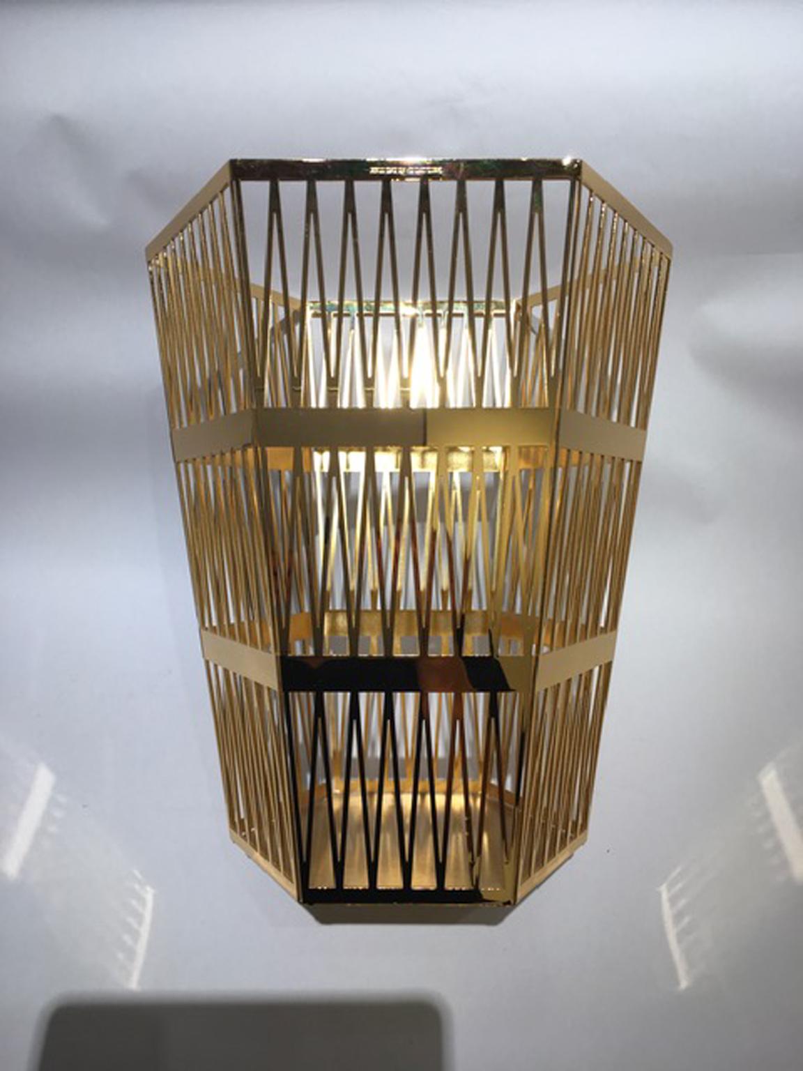 The elegant and modern paper basket in stainless steel, is manufactured in Italy and designed by Richard Hutten. The metal mesh becomes a decorative pattern and the basket could be put on the table or console.