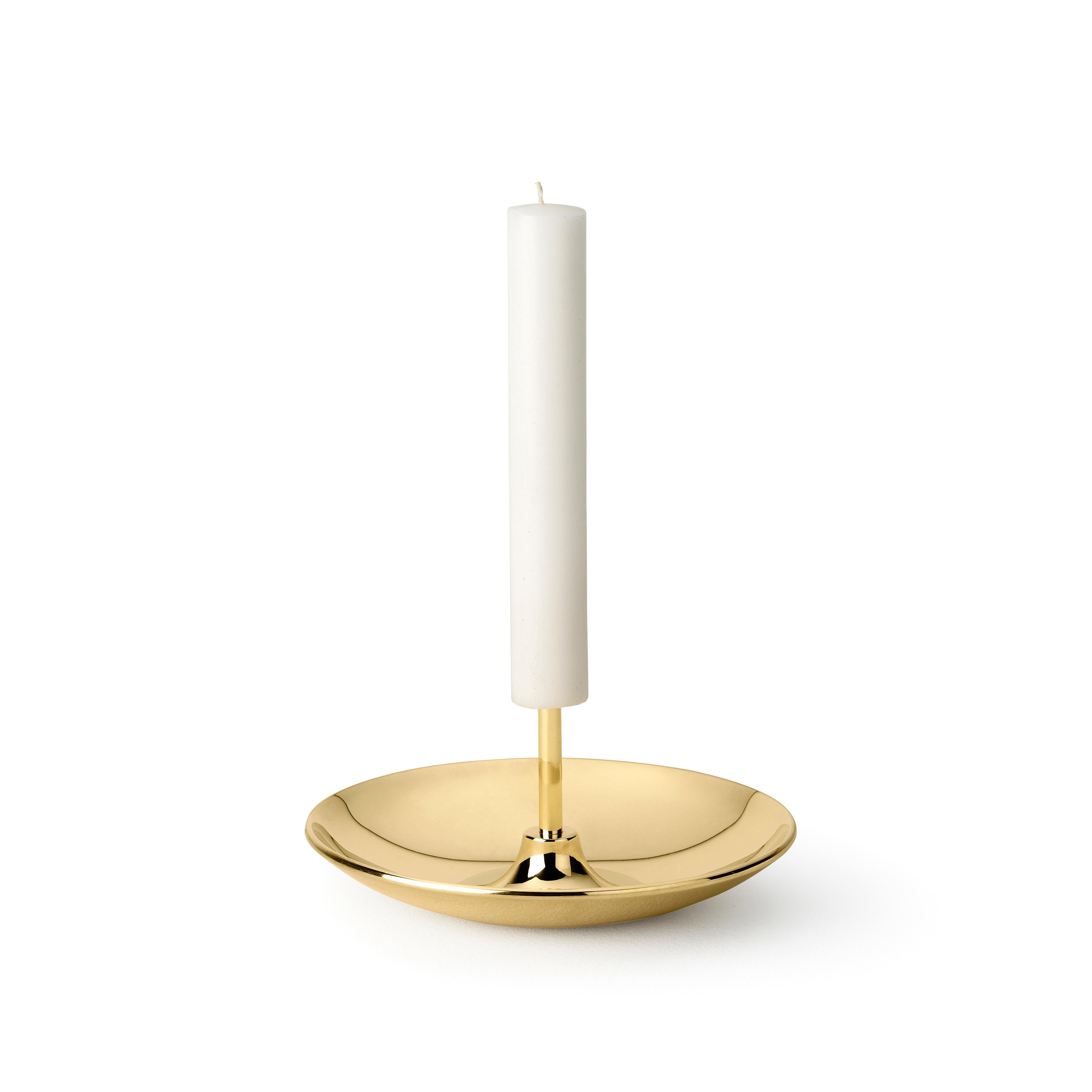Candlestick in brass. The push pin as a representation of the struggle for achievement day by day, months by months, till we conquer. The push pin sconce is embellished with engravings and a shiny brass finish. 

Materials:
Brass.