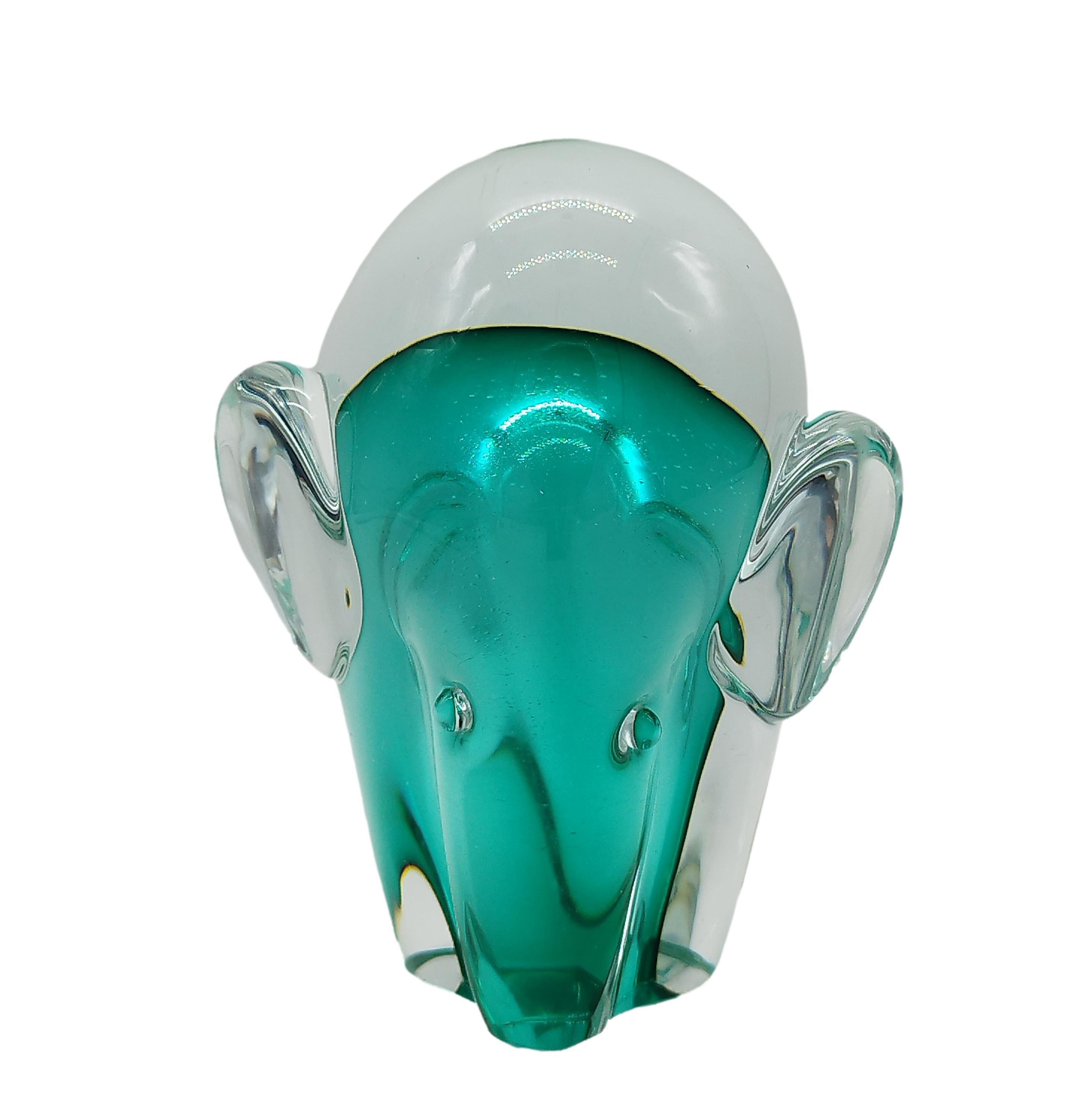 Elephant figure in Murano submerged glass aquamarine green and transparent colors, on the base is engraved the signature of the author Gianpaolo Ghisetti. Italy 1970