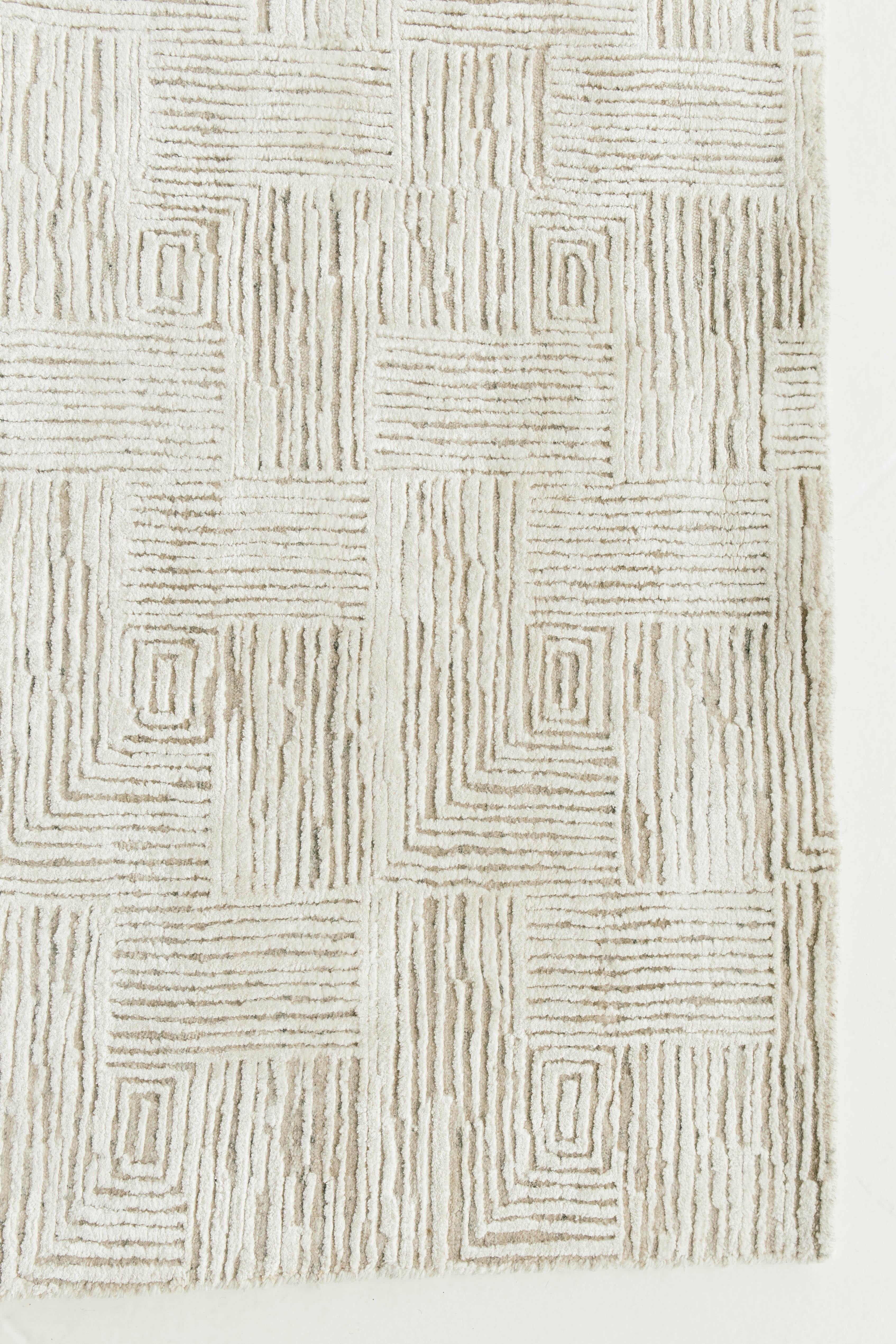 'Ghosita' is luxurious rug with an embossed motif of concentric square patterns. This rug from our Elan collection is sure to elevate any design space. Its contemporary design and neutral color palate will leave lasting impressions.


Rug number