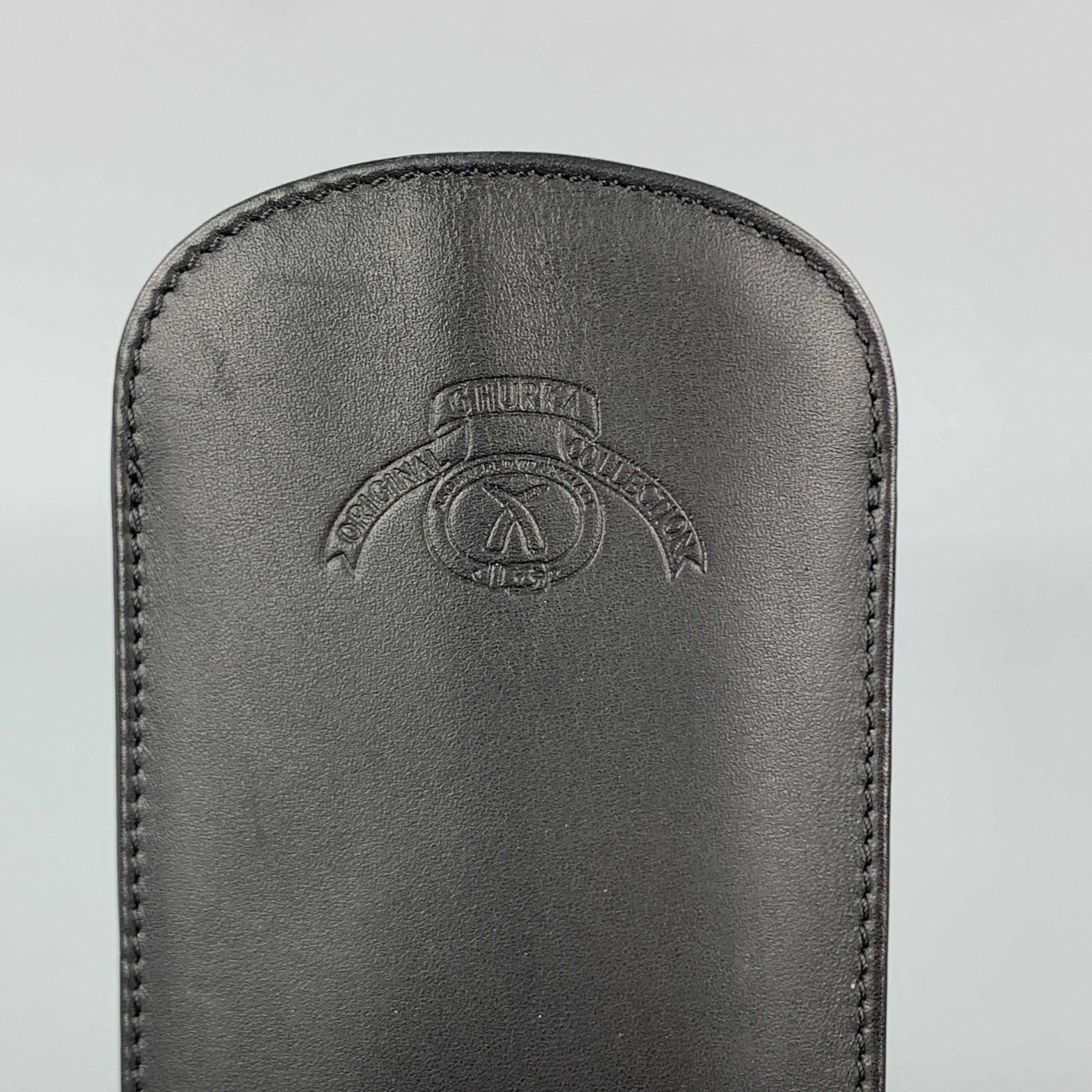GHURKA sunglasses case comes in black leather with a stamped logo. 

Very Good Pre-Owned Condition.

Size: 6.5 x 3.1 in.