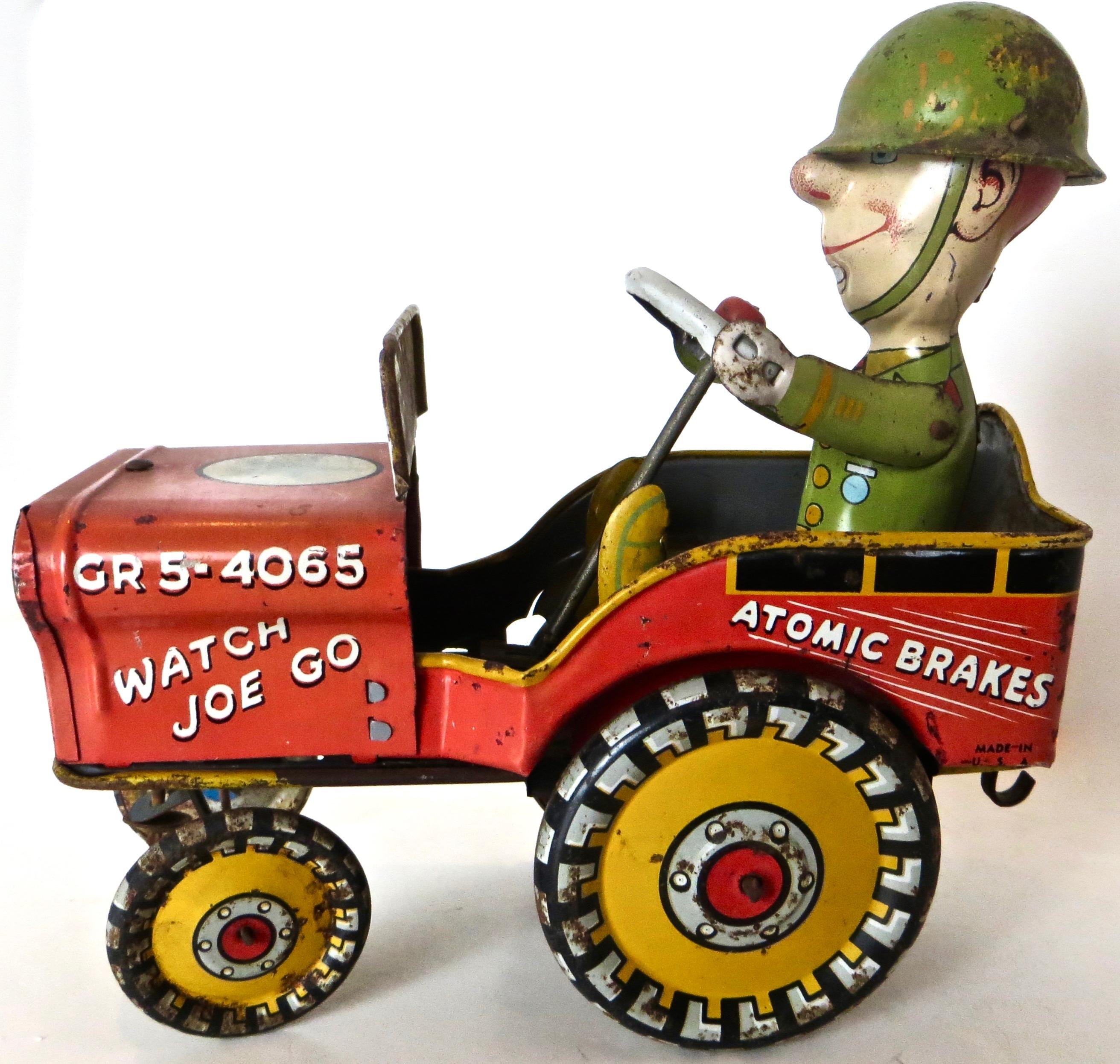 Manufactured circa 1944, in commemoration of the World War II American troops, this very sought after collectible; and highly colorful lithographed tin toy, was made by the 