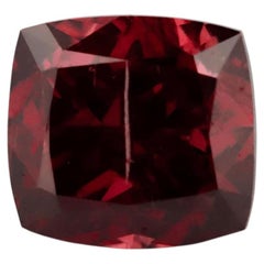 Diamante GIA da 0,15 ct, colore Fancy Deep Brownish Pink, taglio Cushion Mod Brilliant (rosso)