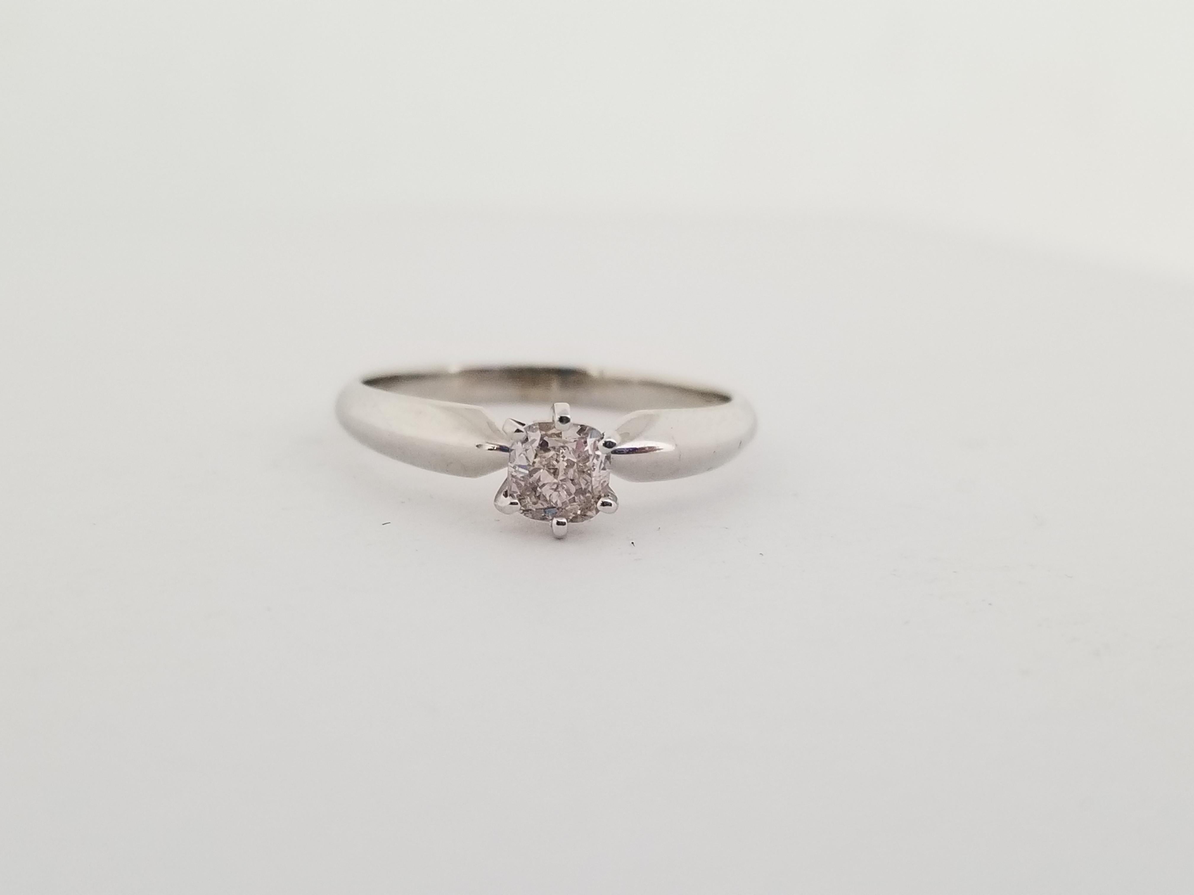 Fancy Pinkish Brown 0.50 Carats Cushion natural diamond set on a 6 prong white gold 14 Karat Ring. Sparkling, Shiny. 
Ring Size 7.25
