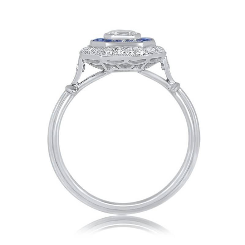 A captivating engagement ring with a double halo embracing a vibrant Asscher cut diamond. The center diamond, certified by GIA, weighs 0.50 carats, showcasing J color and VS2 clarity. The central diamond is encircled by a halo of calibrated