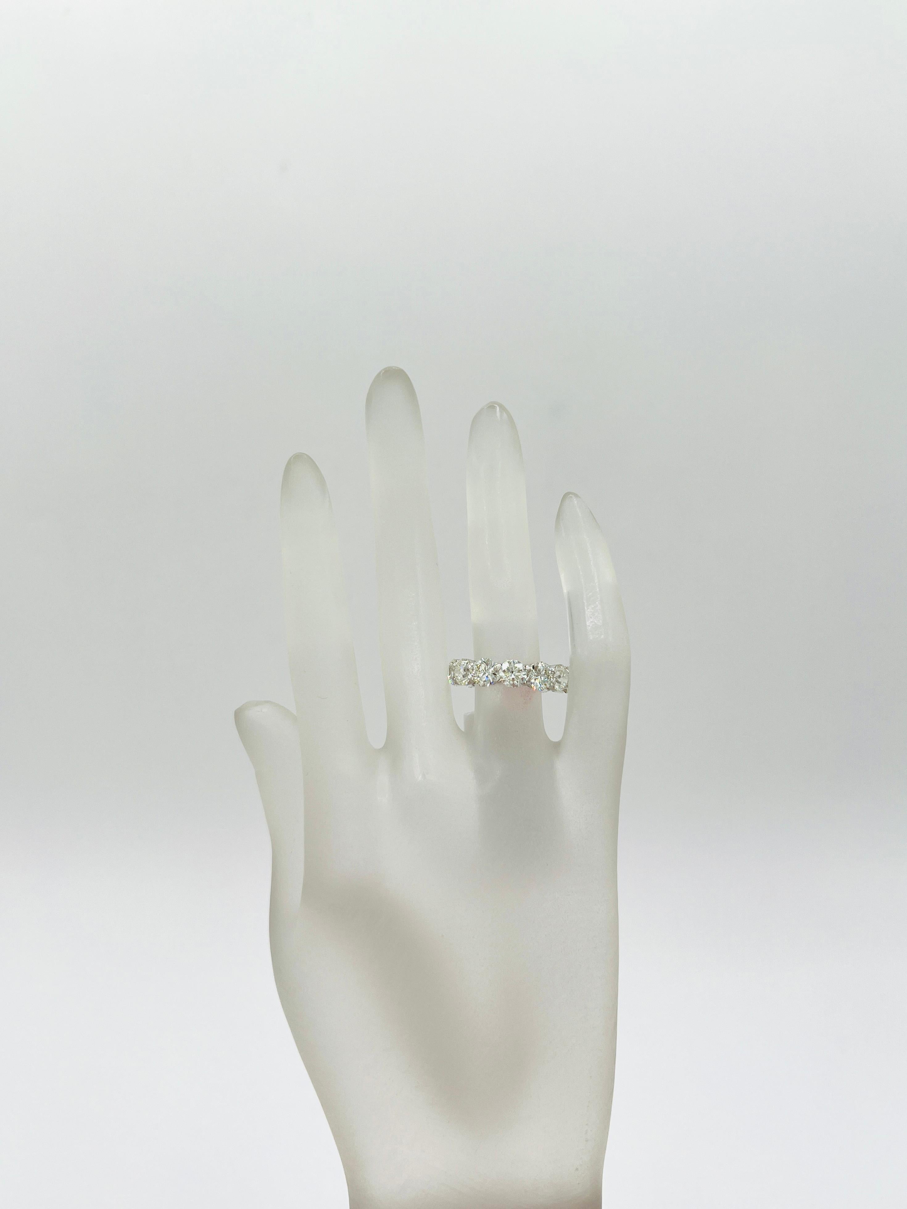 Round Cut GIA 0.60 ct. Each White Diamond Round Eternity Band Ring in 18K White Gold For Sale