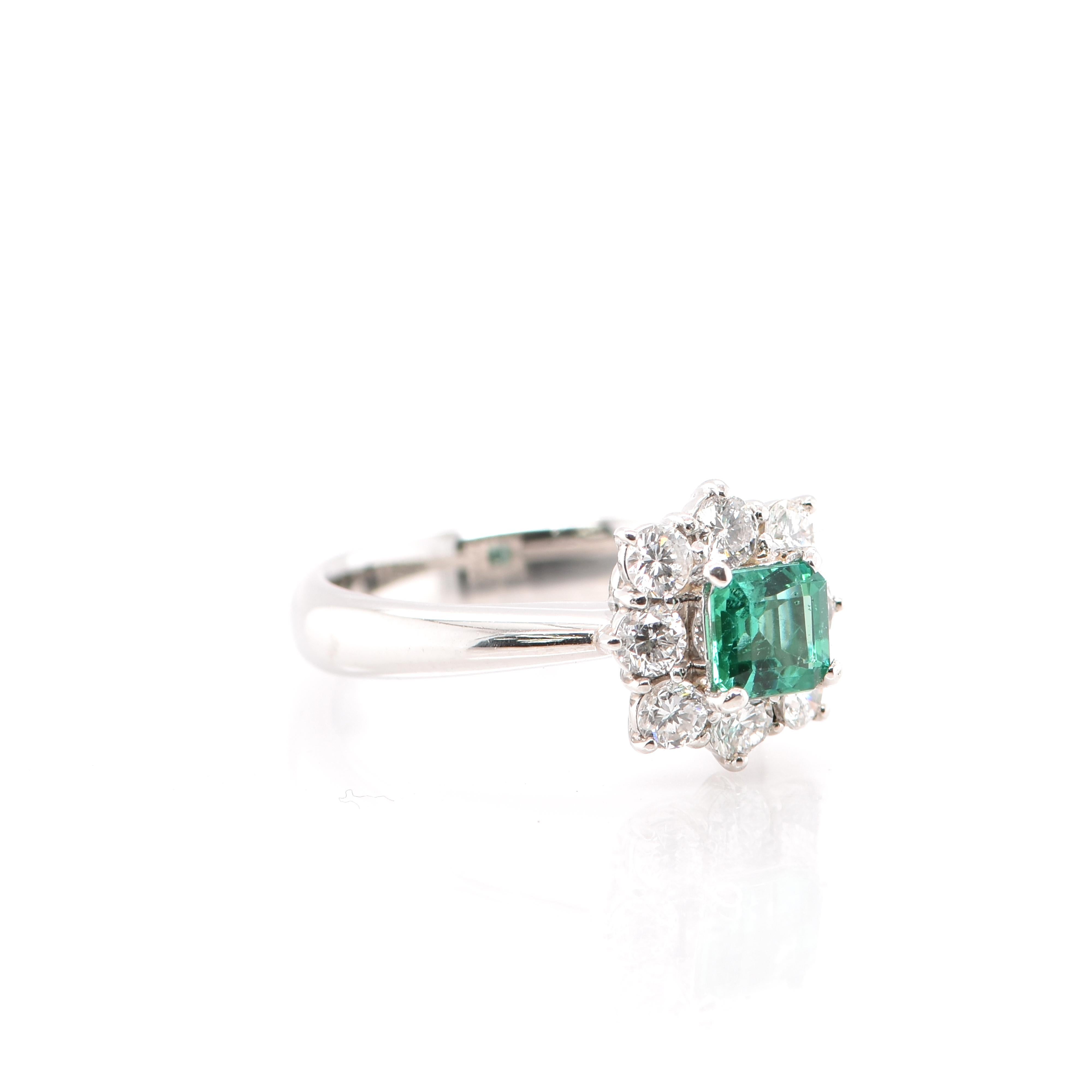 Emerald Cut GIA 0.61 Carat No Oil Colombian Emerald and Diamond Ring Set in Platinum