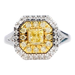 GIA 0.65 Carat Fancy Yellow Diamond 18K Gold Halo Engagement Ring