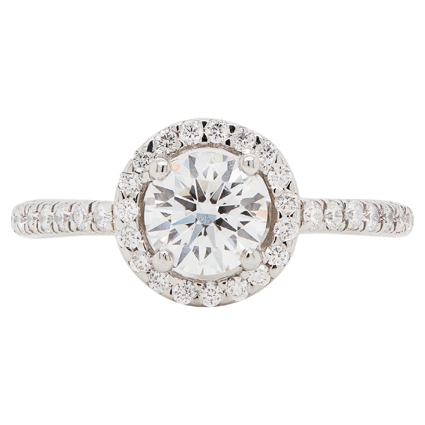GIA 0.70ct E VS1 Diamond and Platinum Round Halo Cluster Engagement Ring